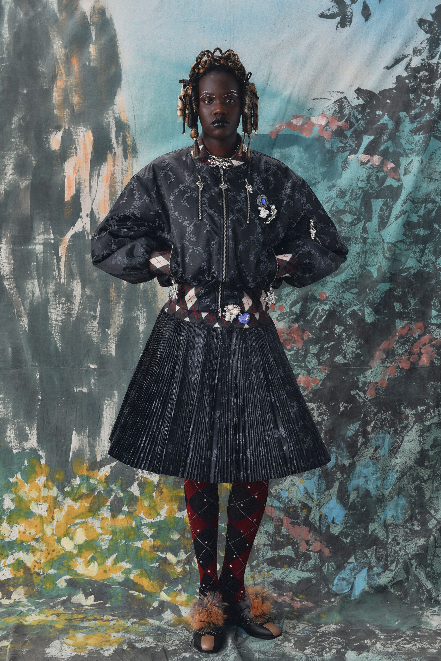 black relaxed jacket with pleated skirt