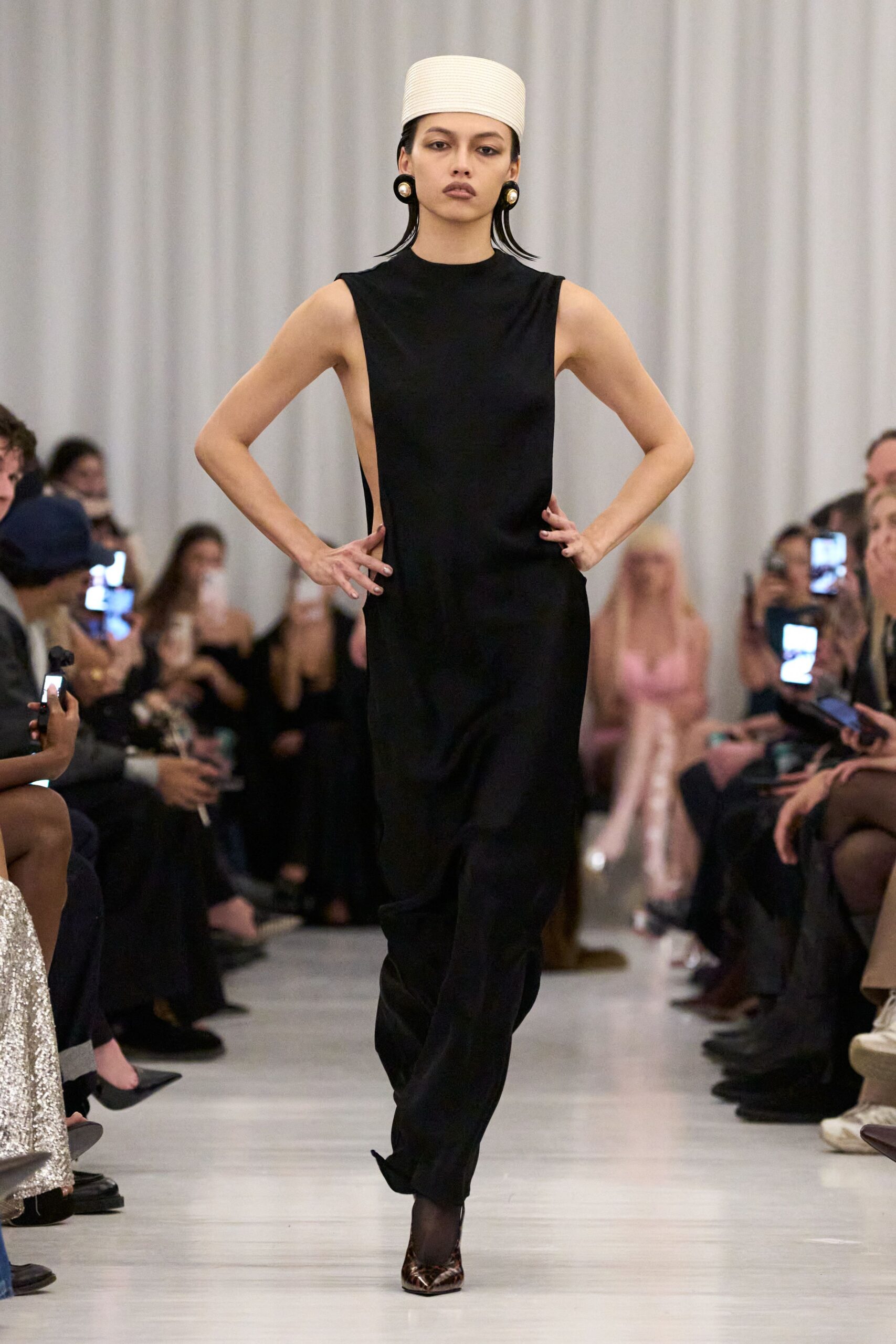 black silk sleeveless high-neck fitted jumpsuit