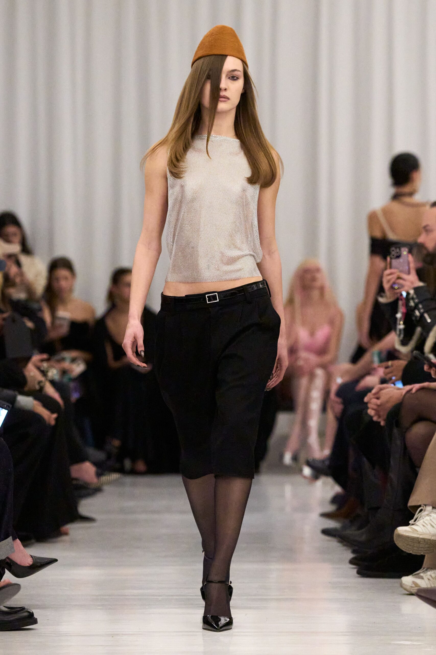 beige silk sleeveless high-neck fitted textured top