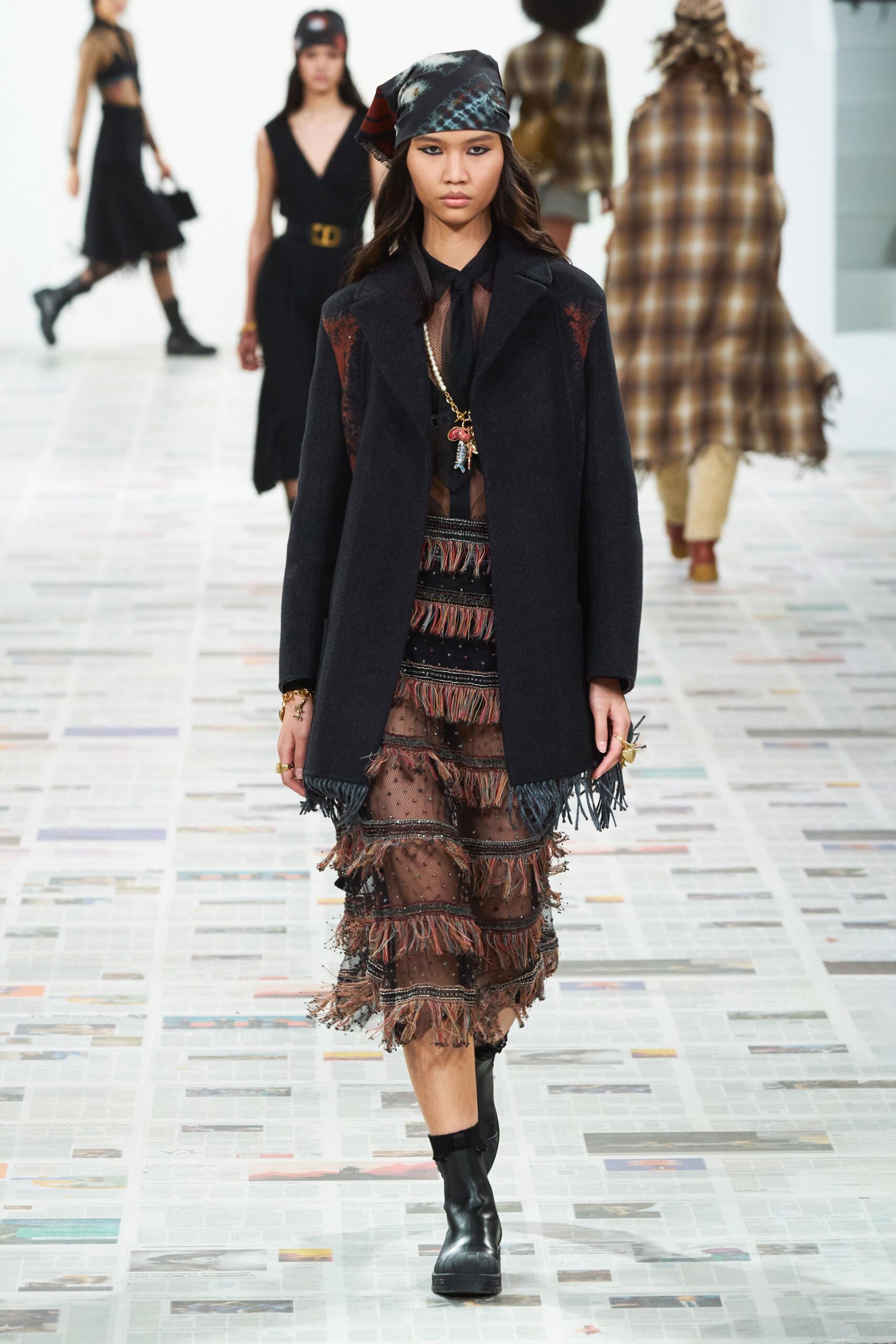 black wool coat and tiered dress