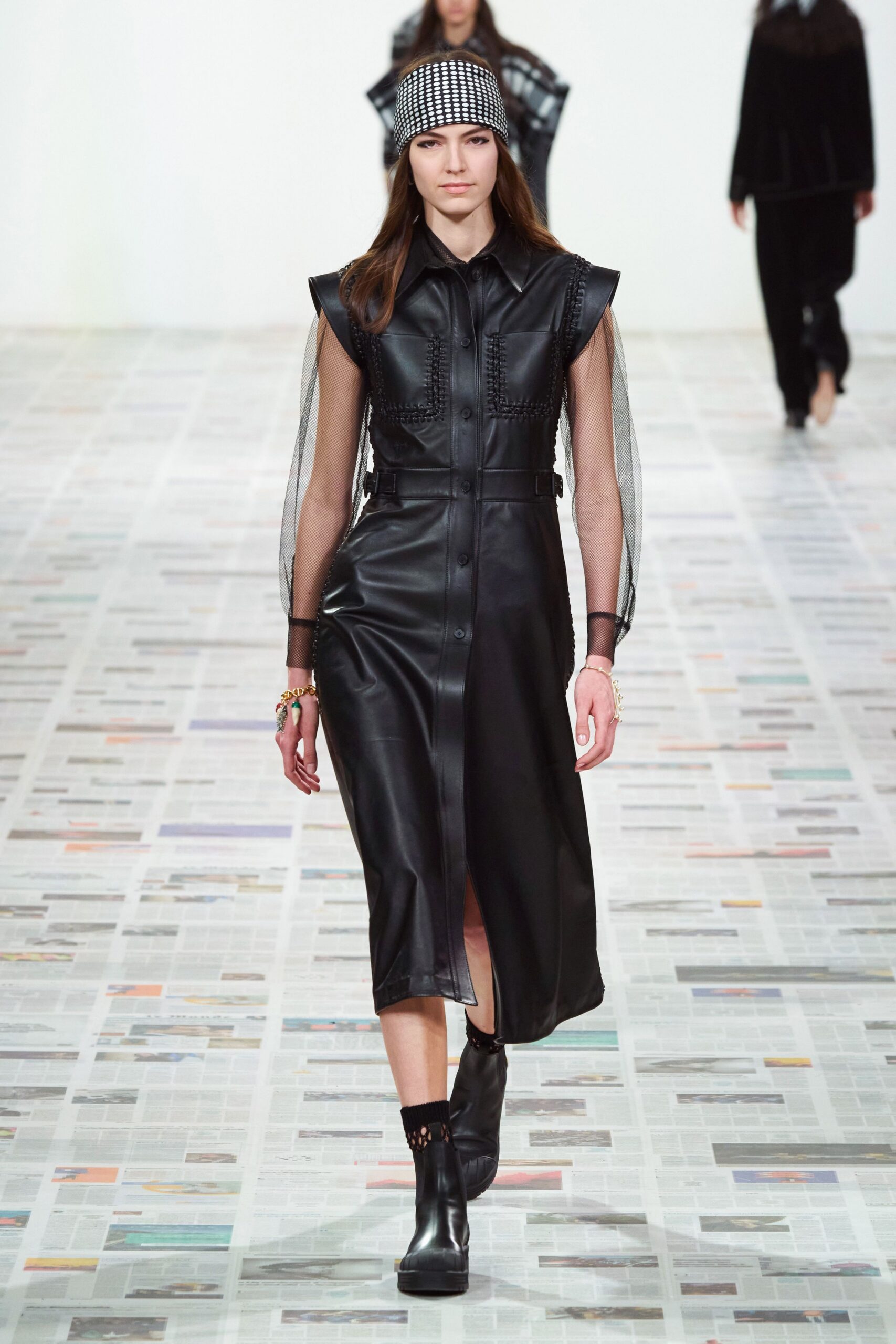 black leather sleeveless collared fitted buttoned pleated dress