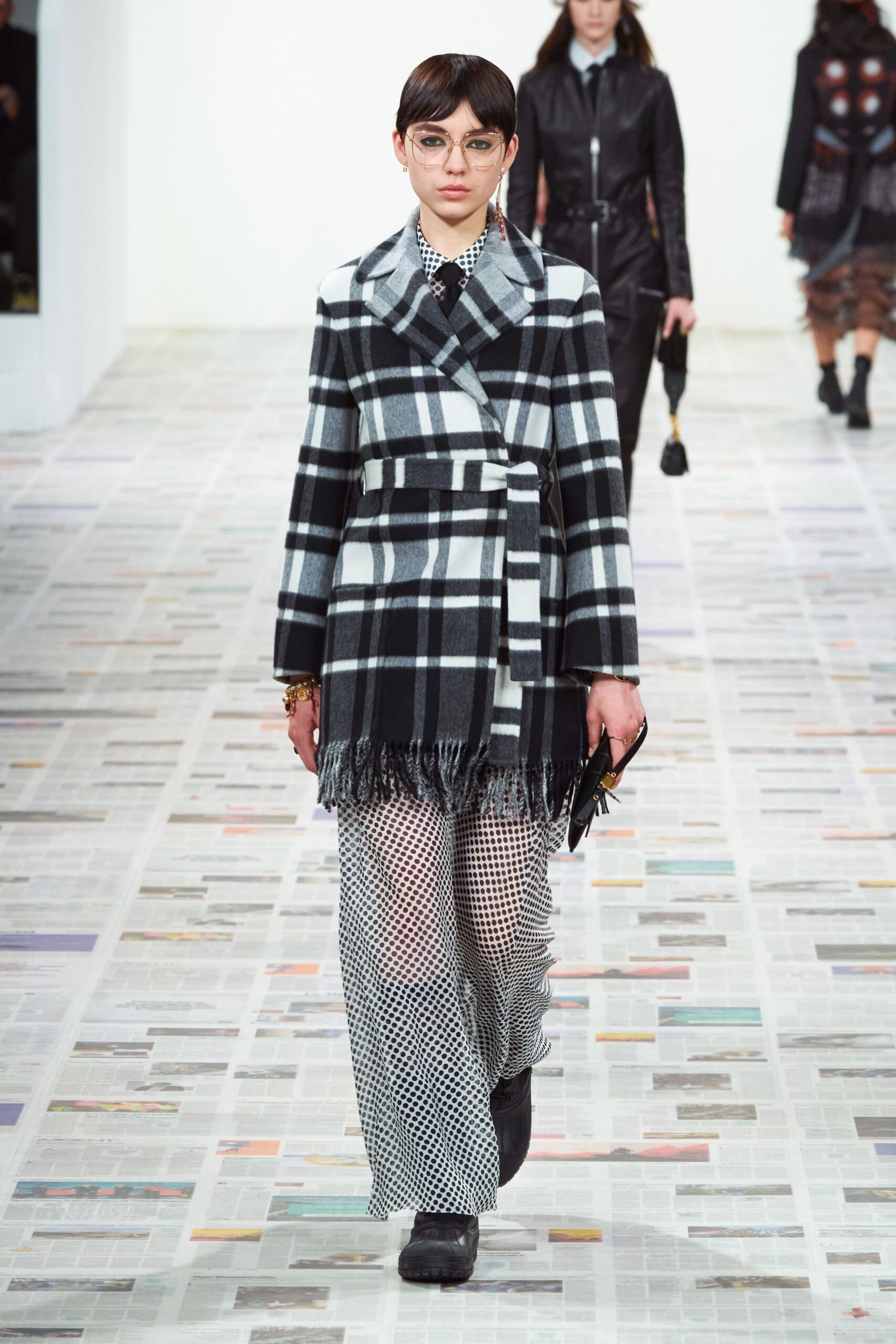 checked coat with polka-dot dress