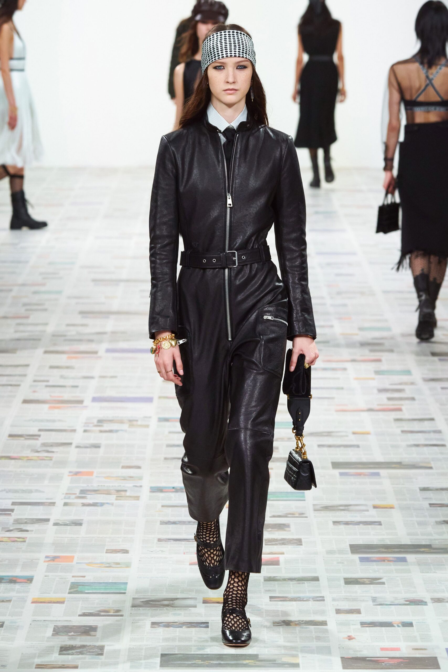 black leather long-sleeve collared fitted zippered belted jumpsuit