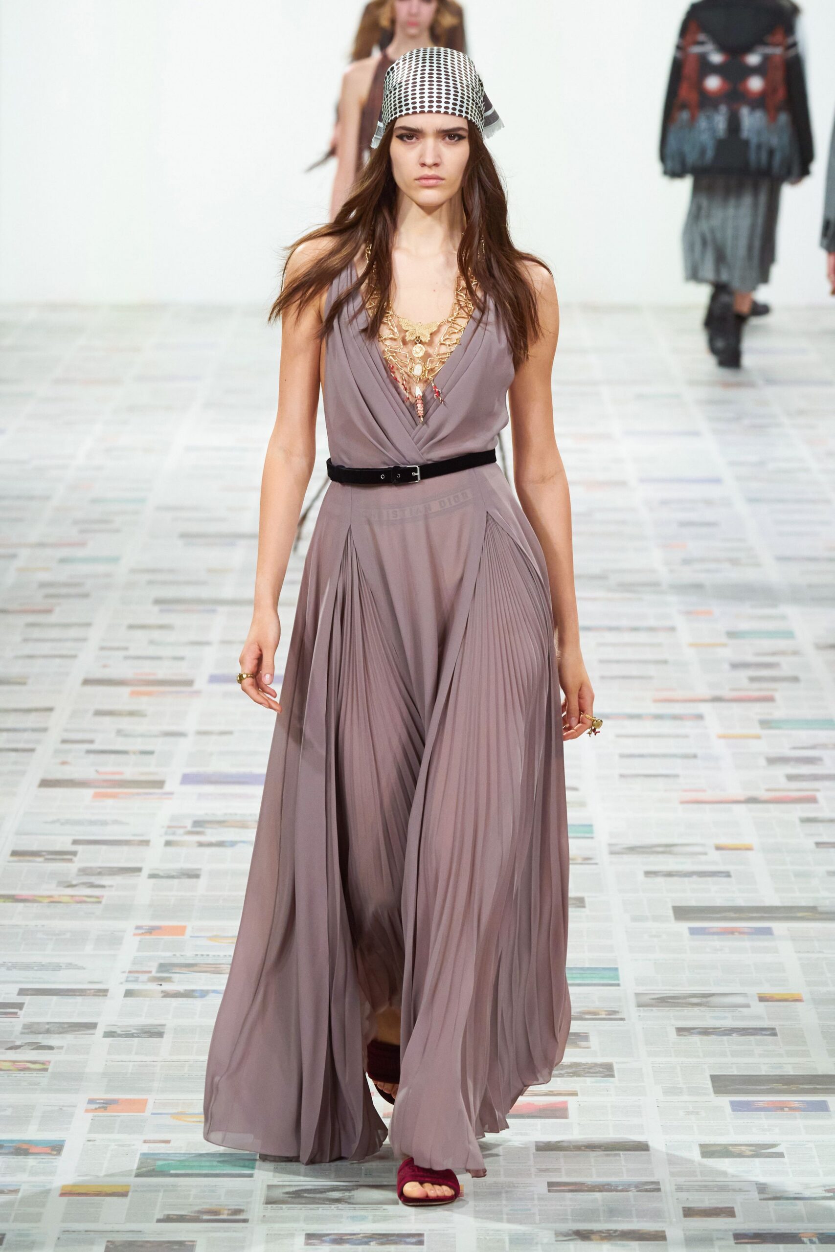 gray silk sleeveless v-neck fitted pleated flowing dress