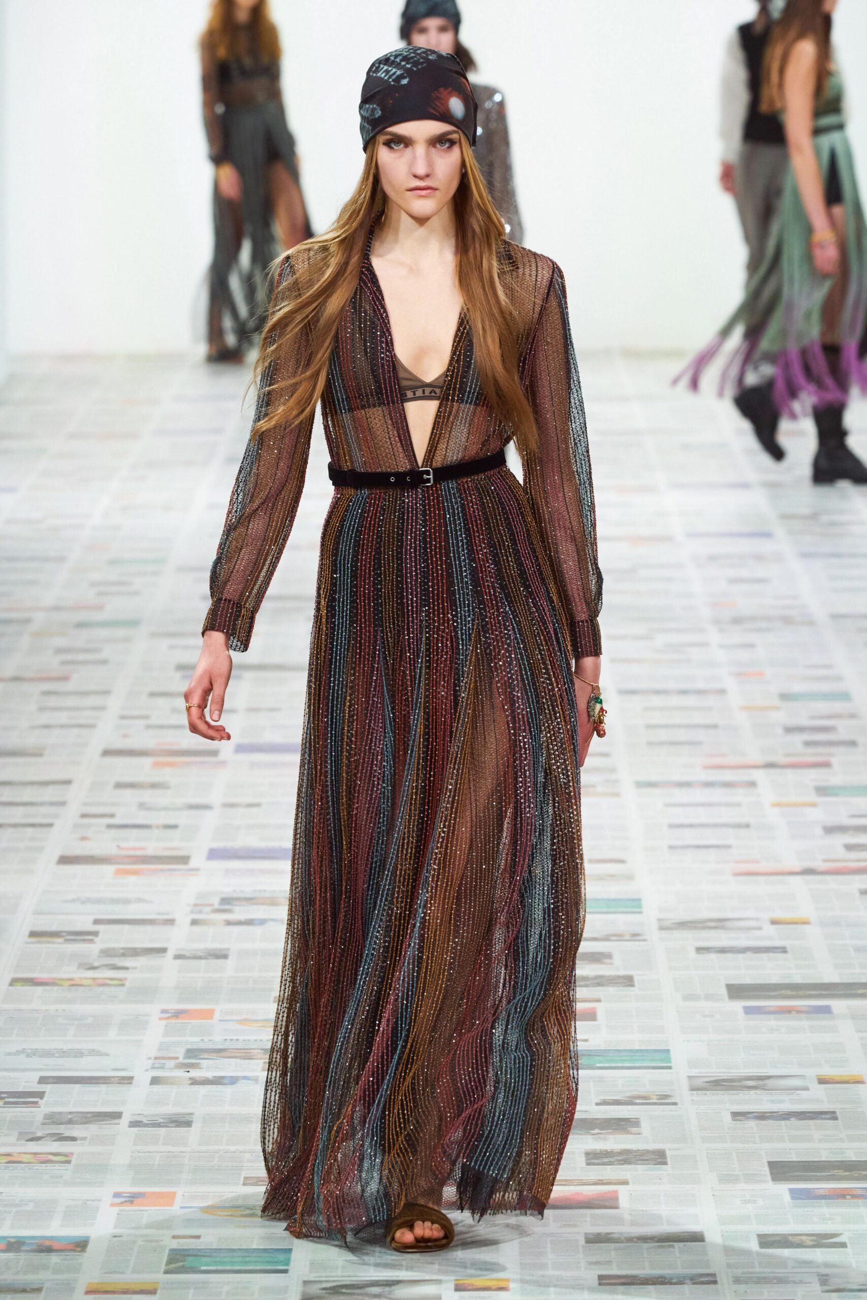 black multi-layered gown with hat