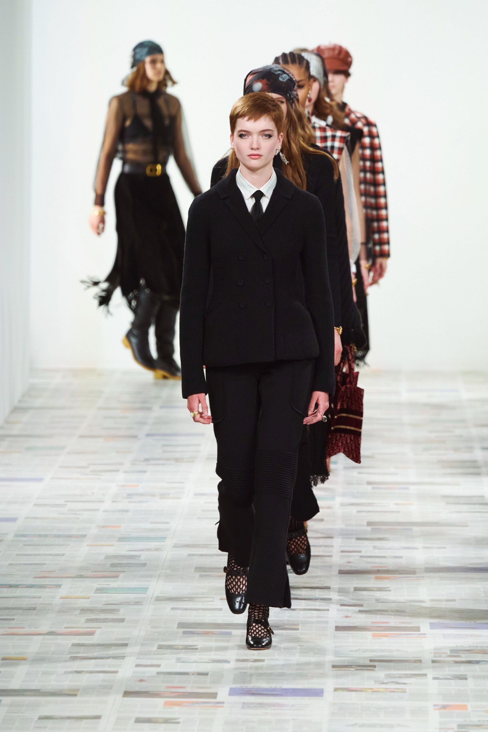 black tailored suit with embellished shoes
