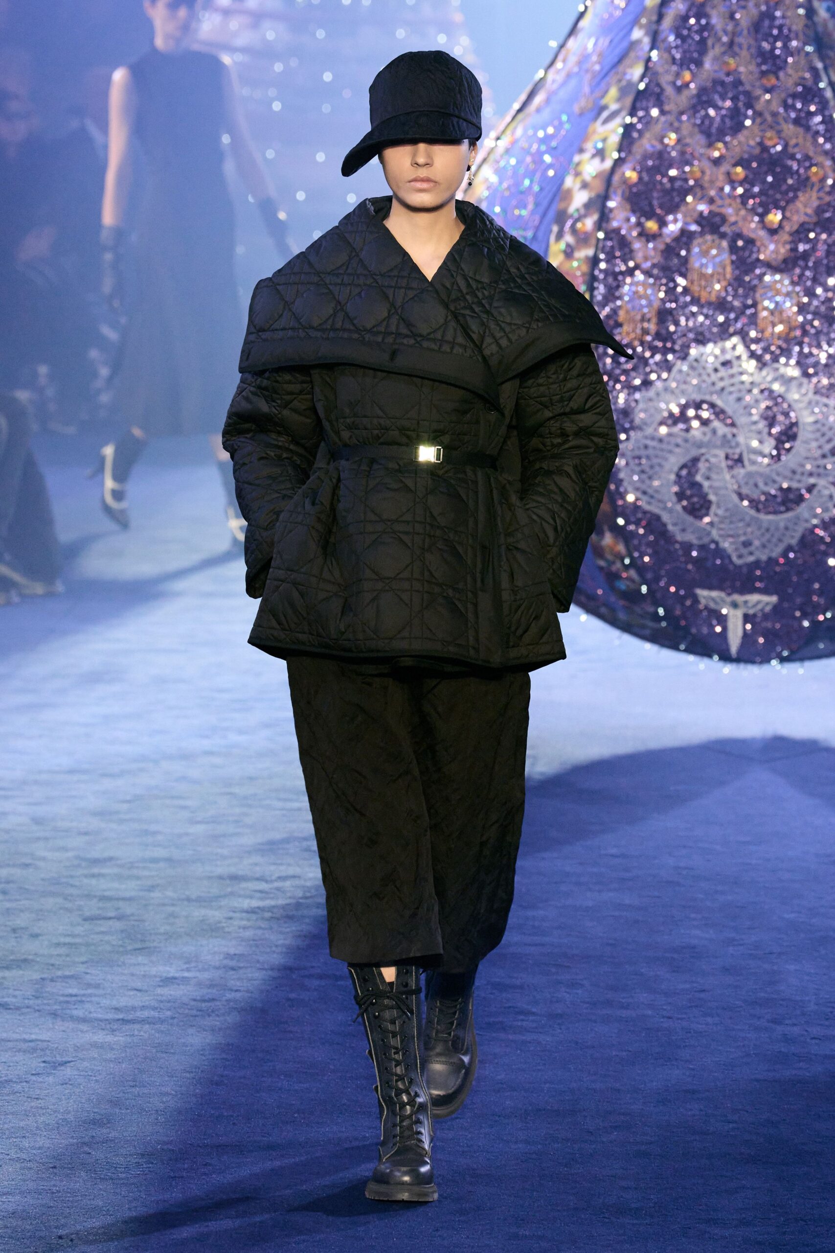 black quilted coat with wide-leg pants