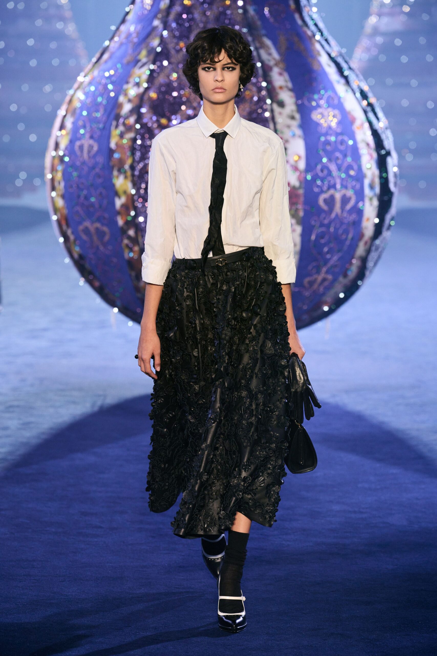 white fitted shirt black pleated skirt