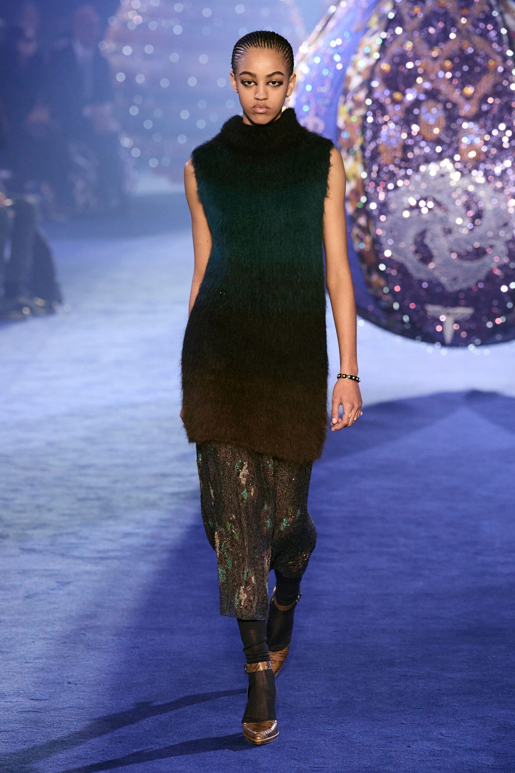 green brown sleeveless top with flared pants