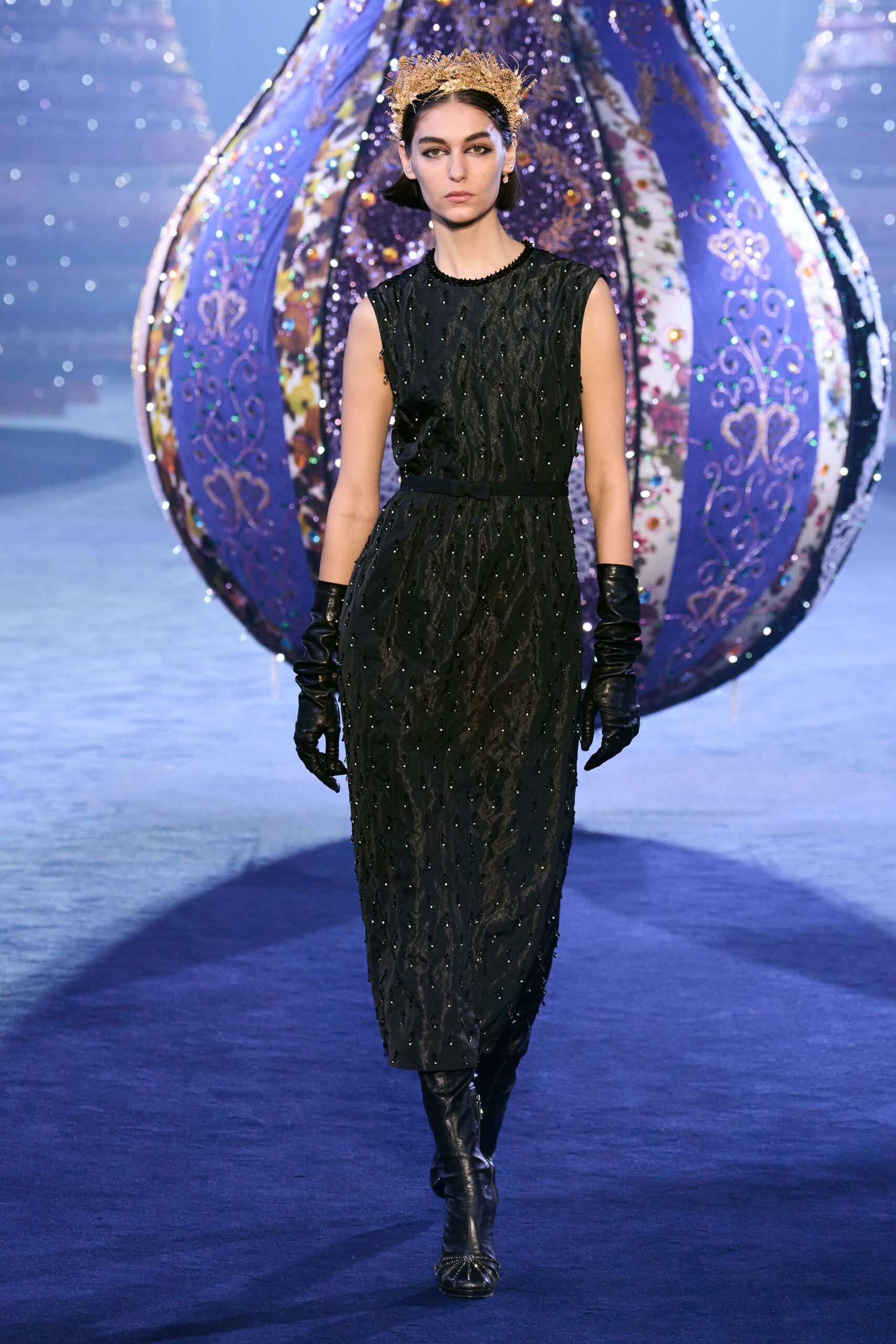 black embroidered midi dress with gloves and boots