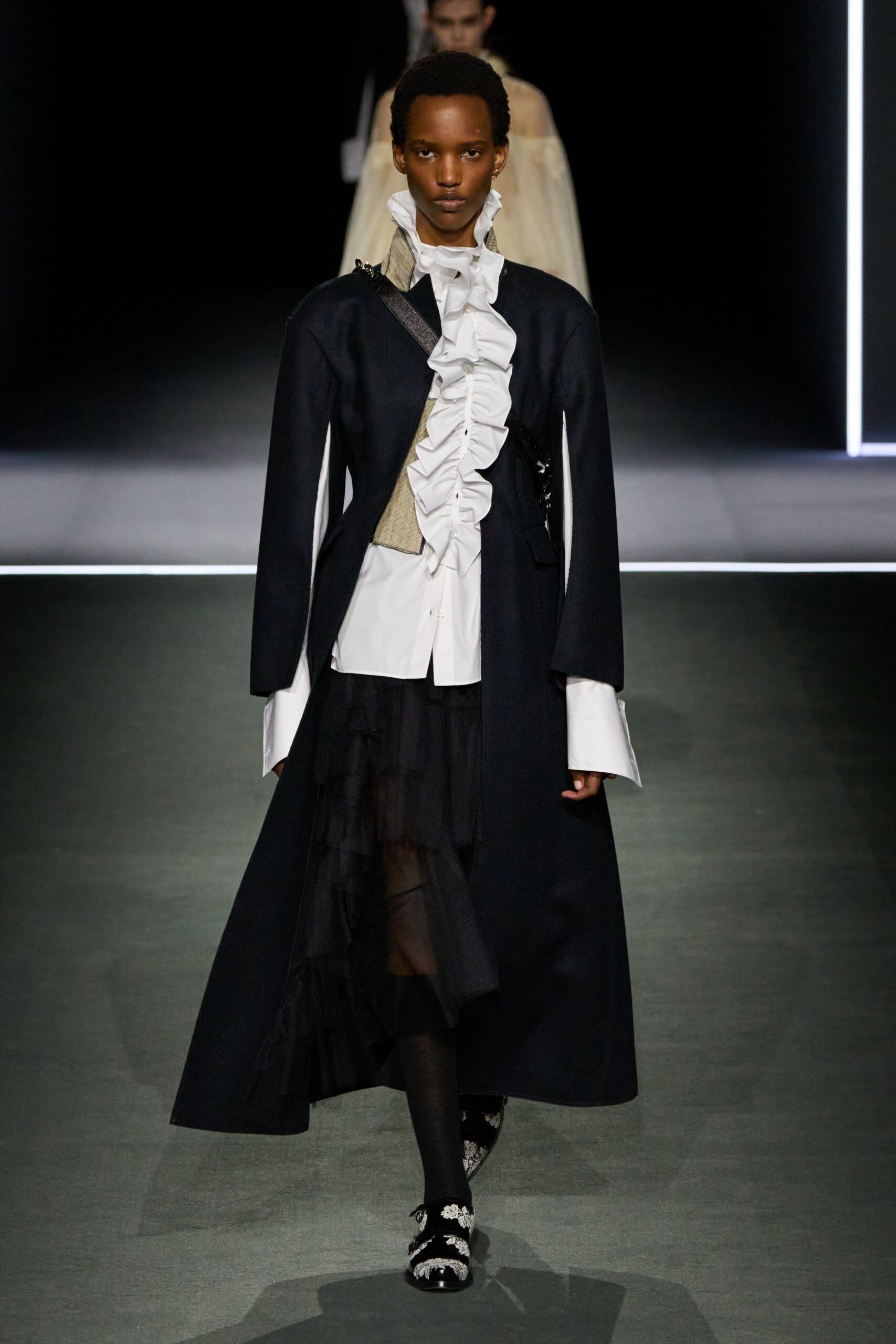 black wool long-sleeve collared fitted ruffled layered coat