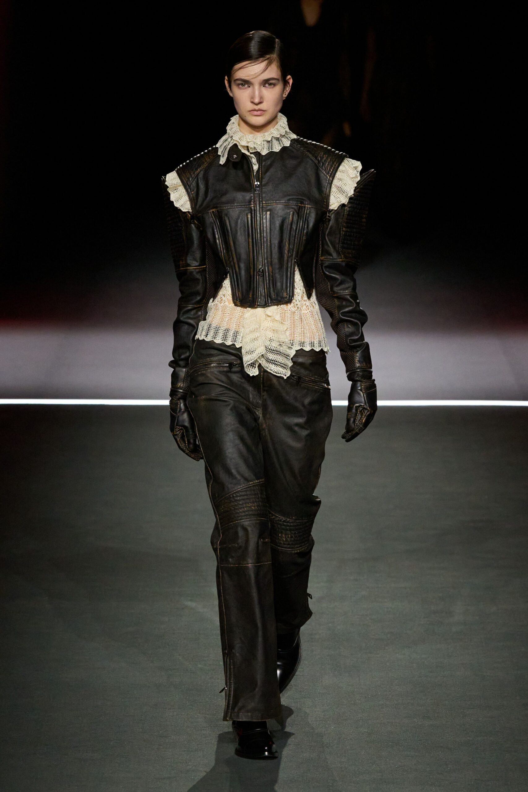 black leather long-sleeve collared fitted zippered pleated jacket