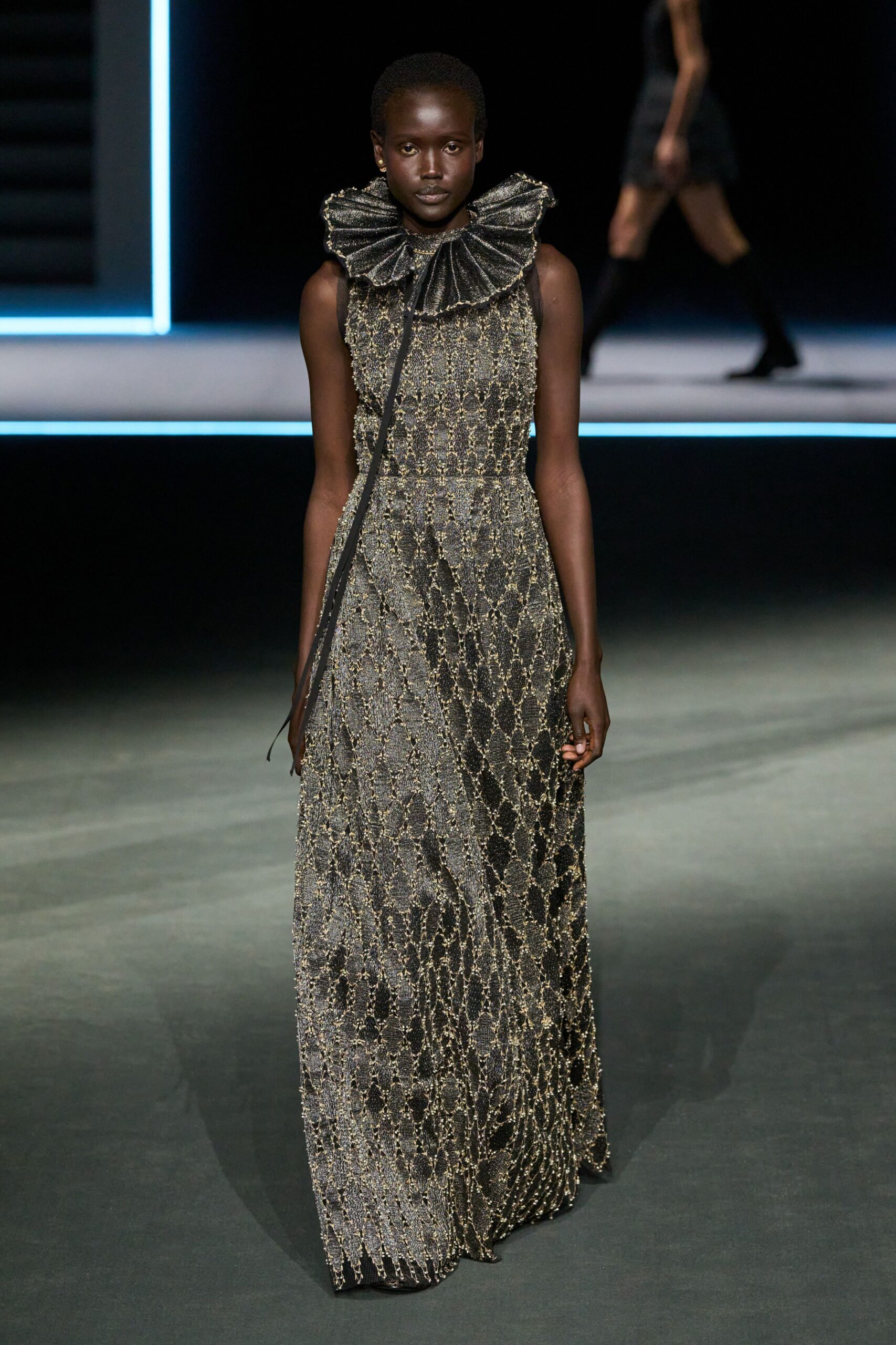 black and gold embroidered gown