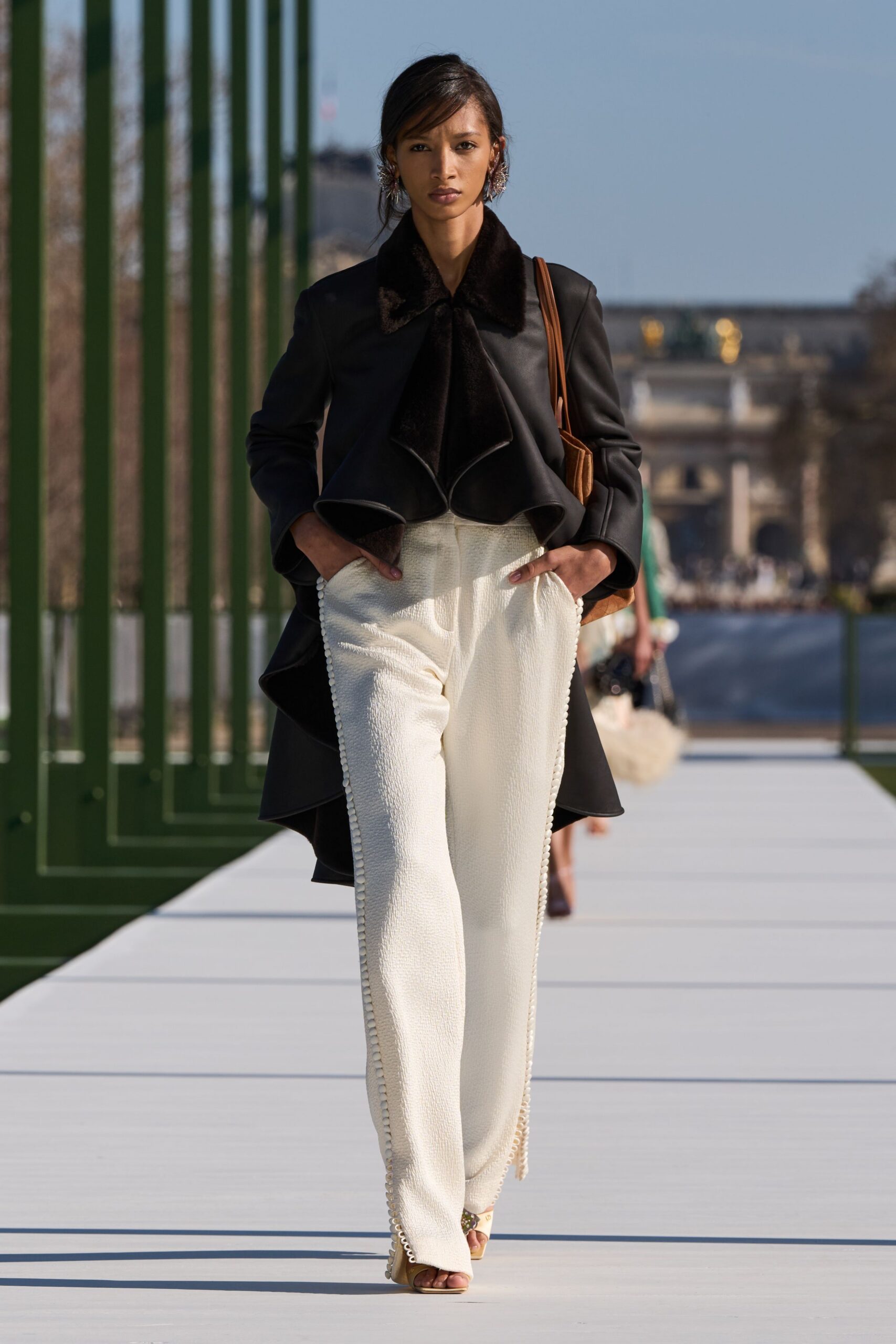 black wool long-sleeve collared structured draped coat