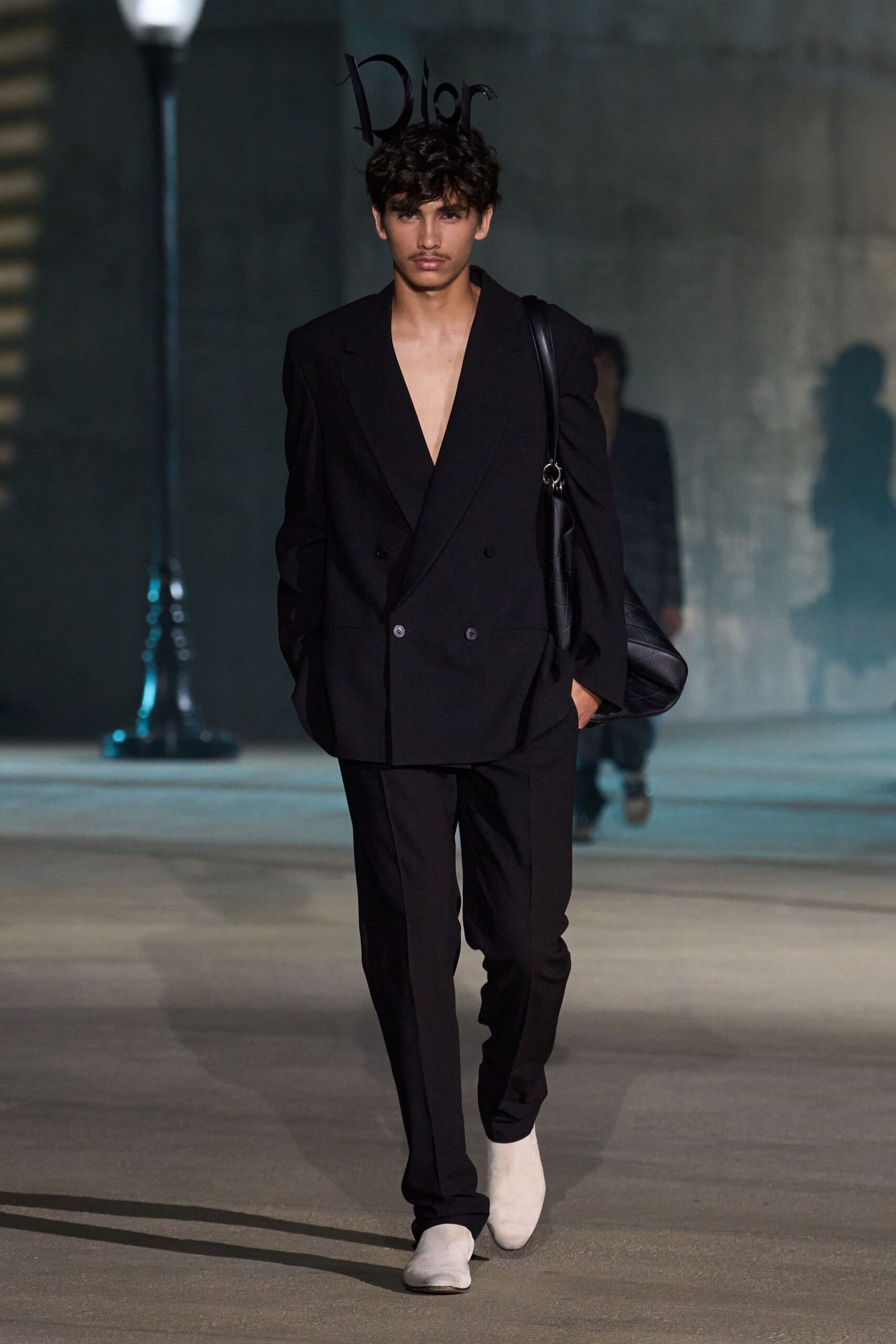 black long-sleeve v-neck tailored suit
