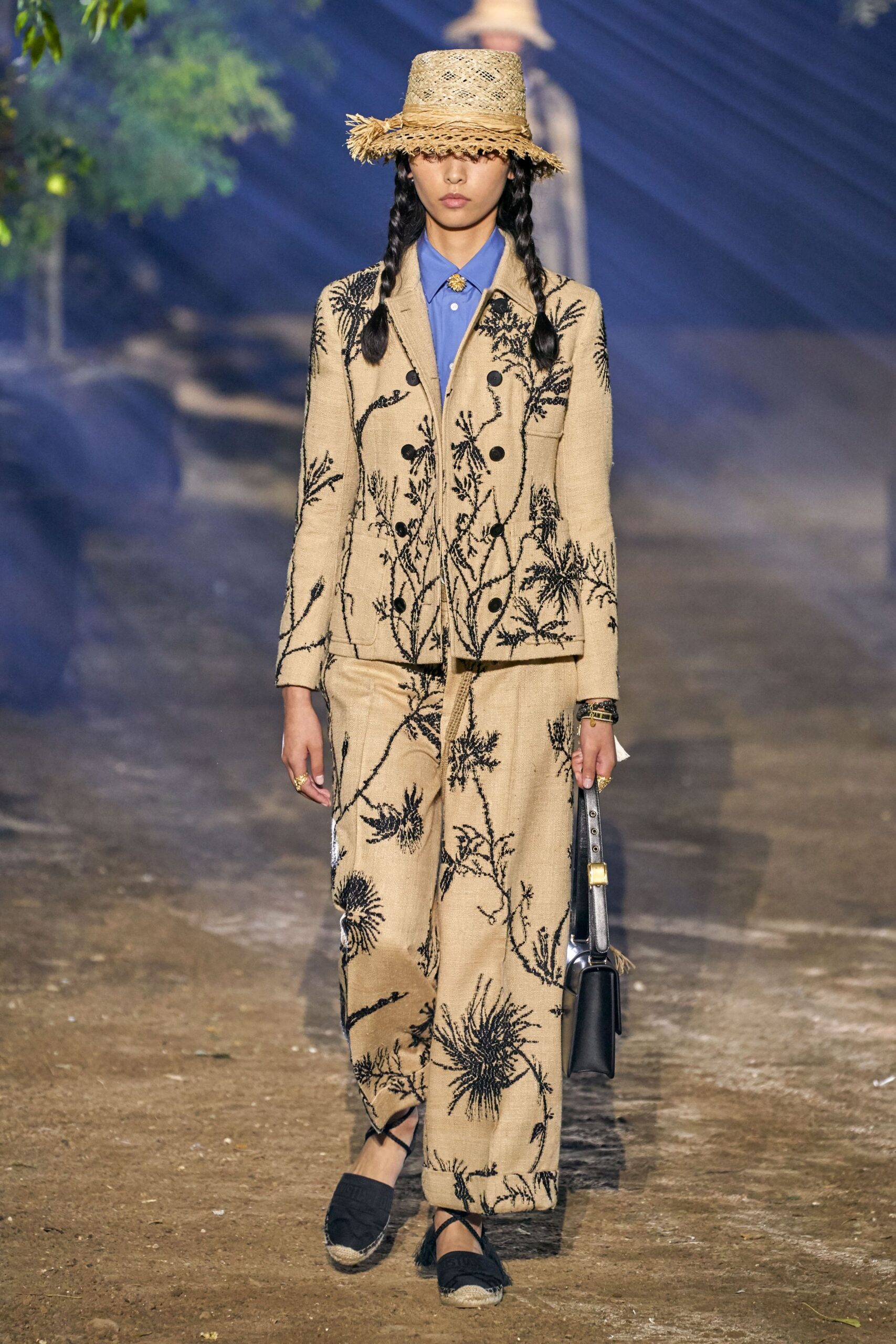 beige embroidered suit with blue shirt