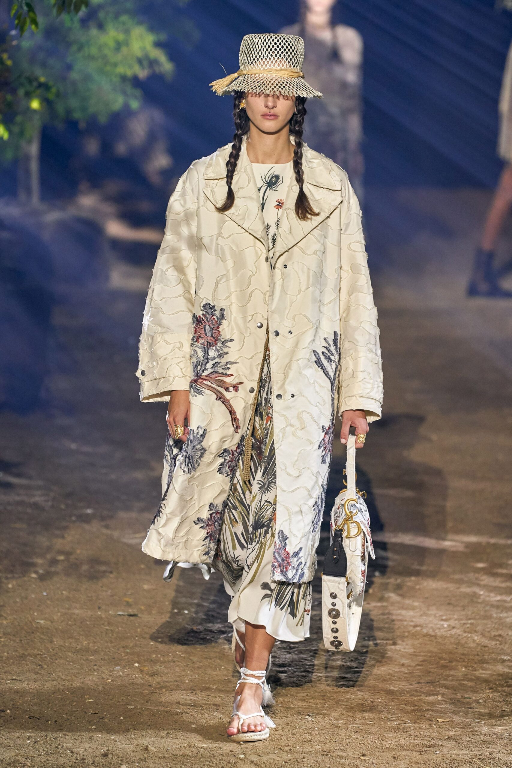 white embroidered coat over floral dress