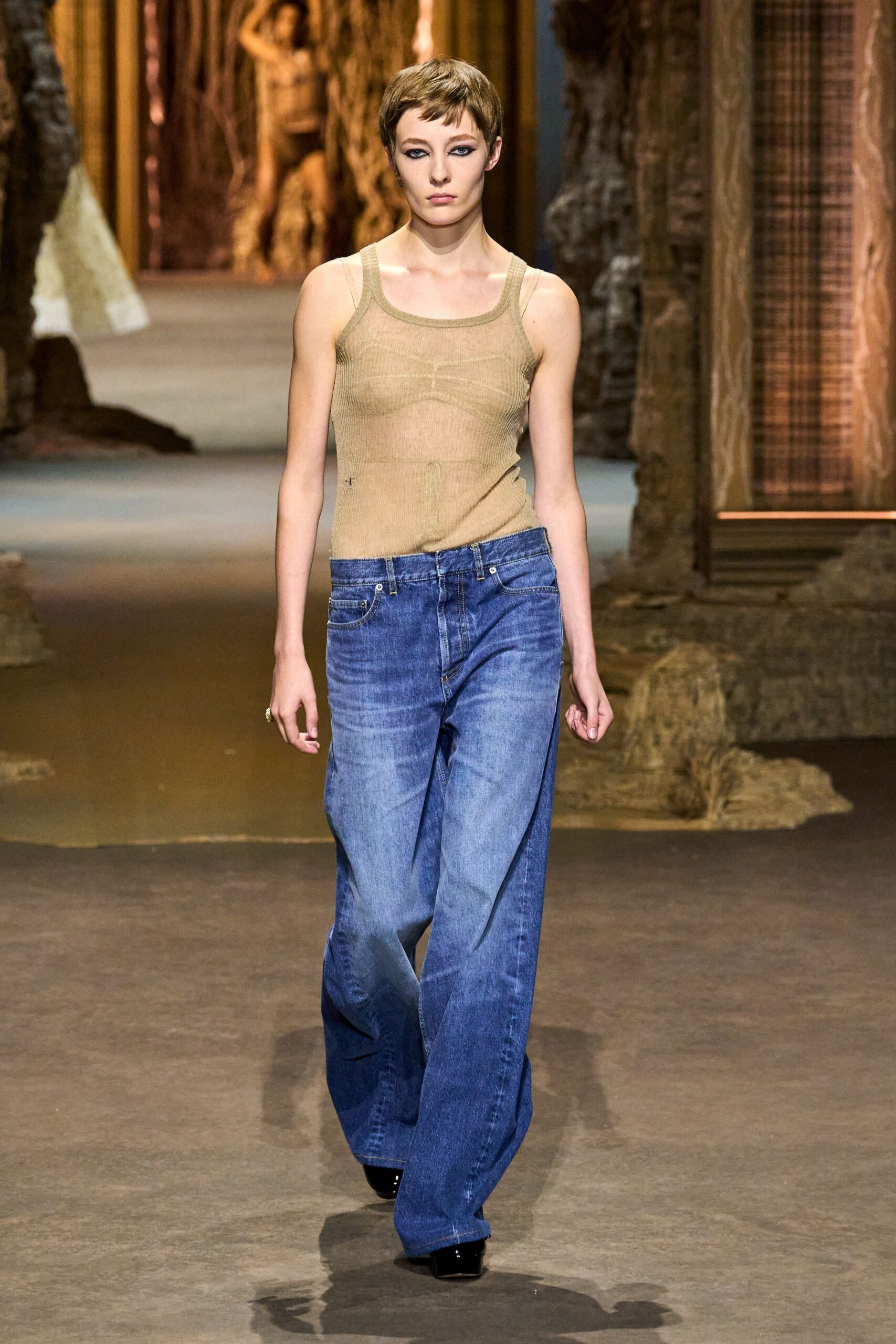 beige tank-top with relaxed jeans