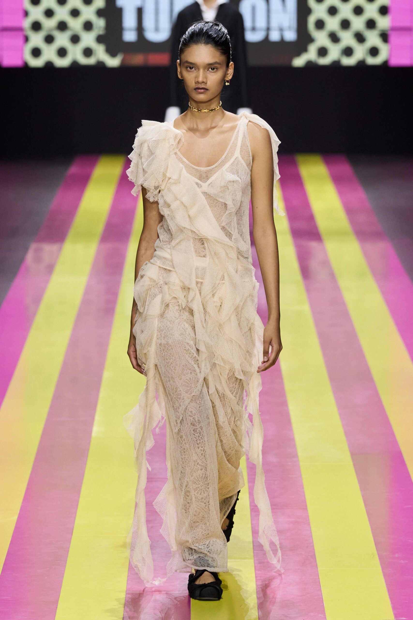 beige lace ruffled maxi dress with black shoes
