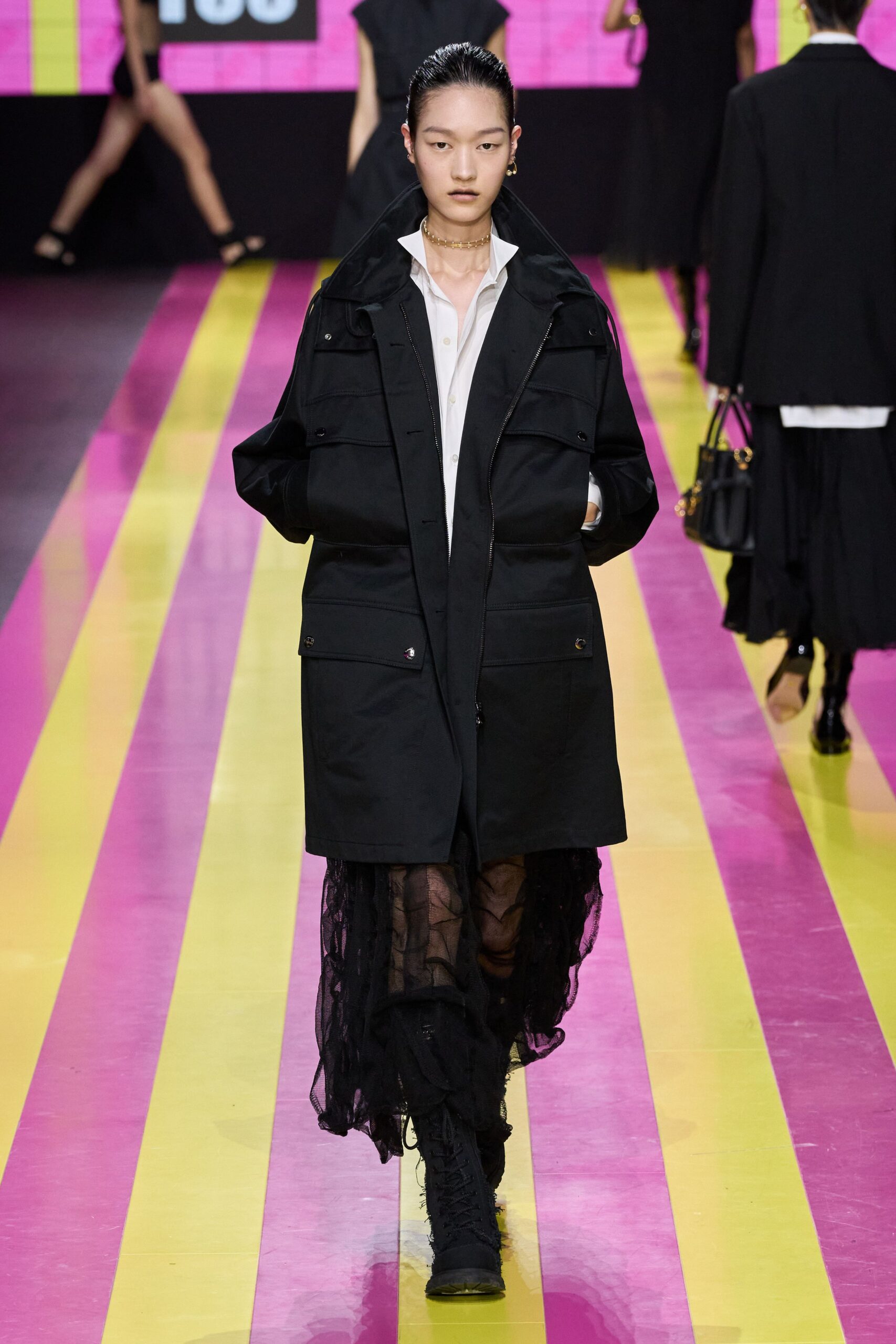 oversized black coat with tulle skirt