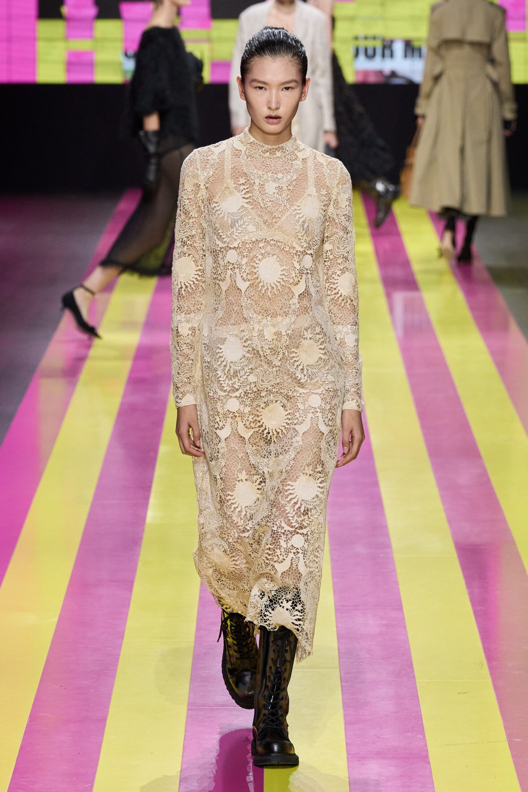 beige lace midi dress with black boots