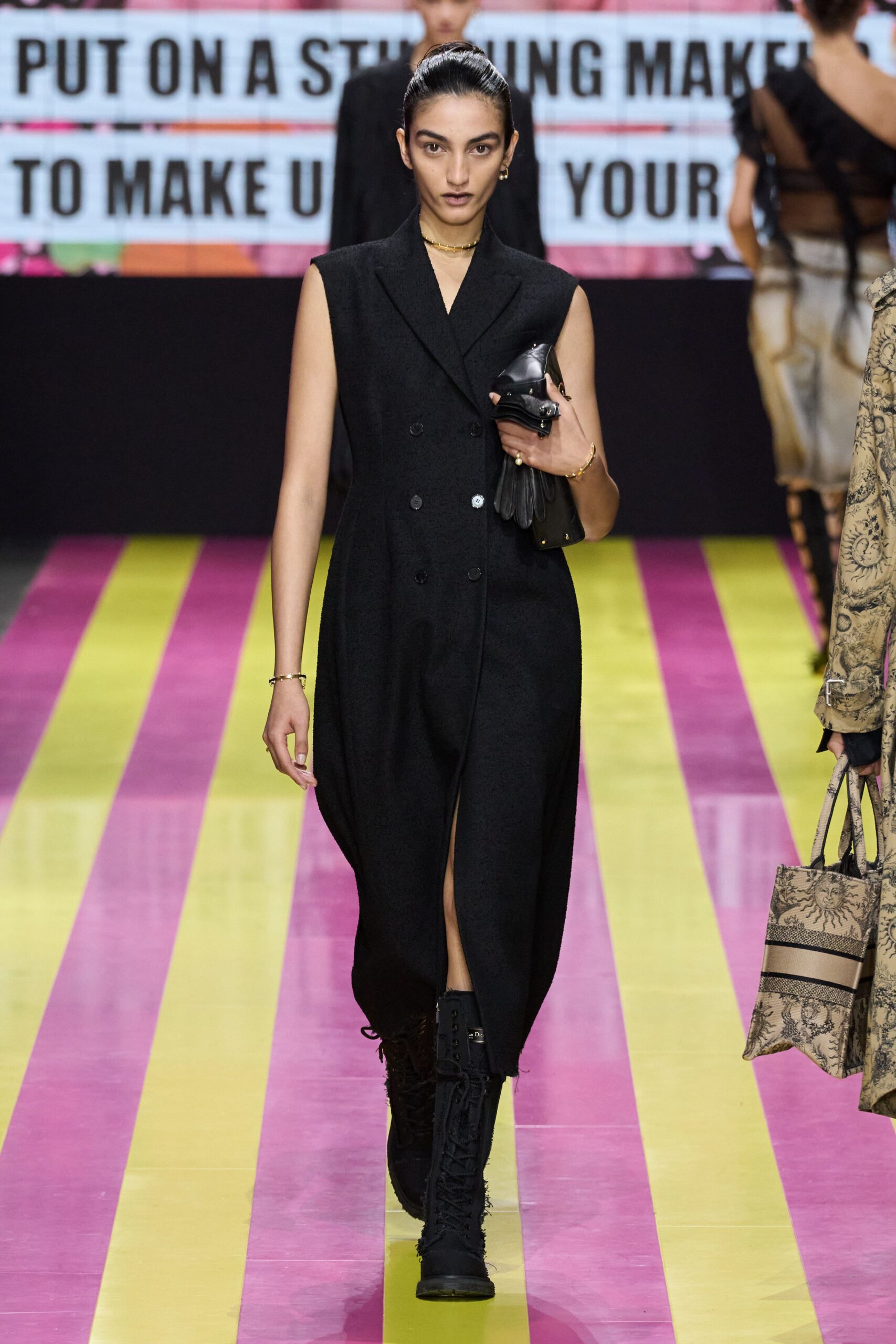 black wool sleeveless midi dress with boots