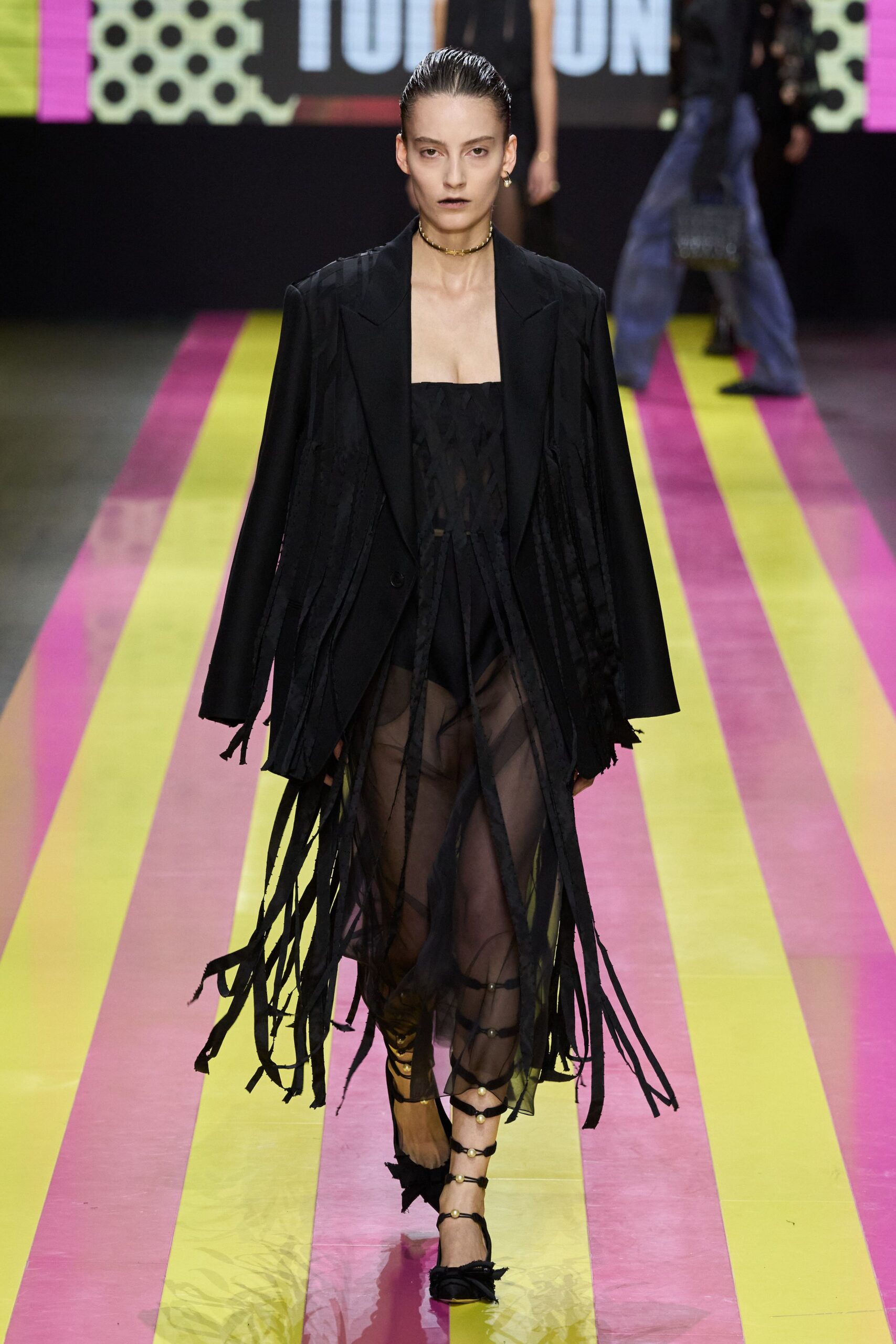 black blazer and sheer dress