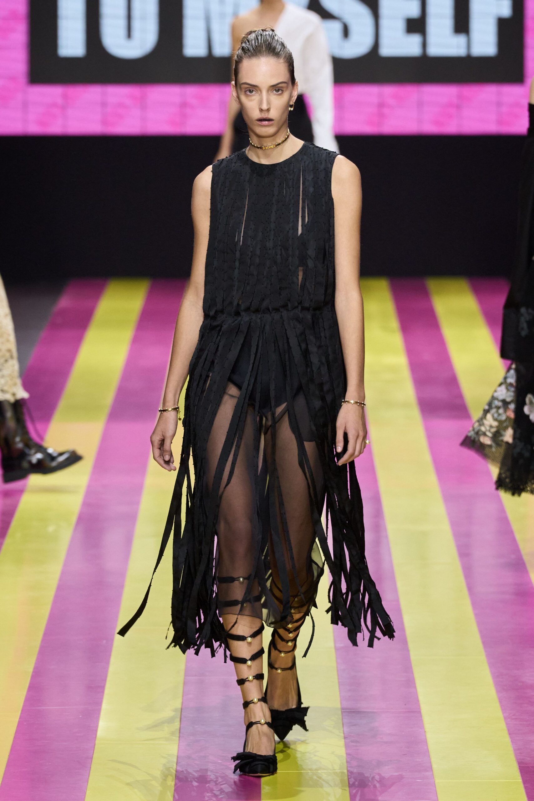 black fringed midi dress with strappy shoes