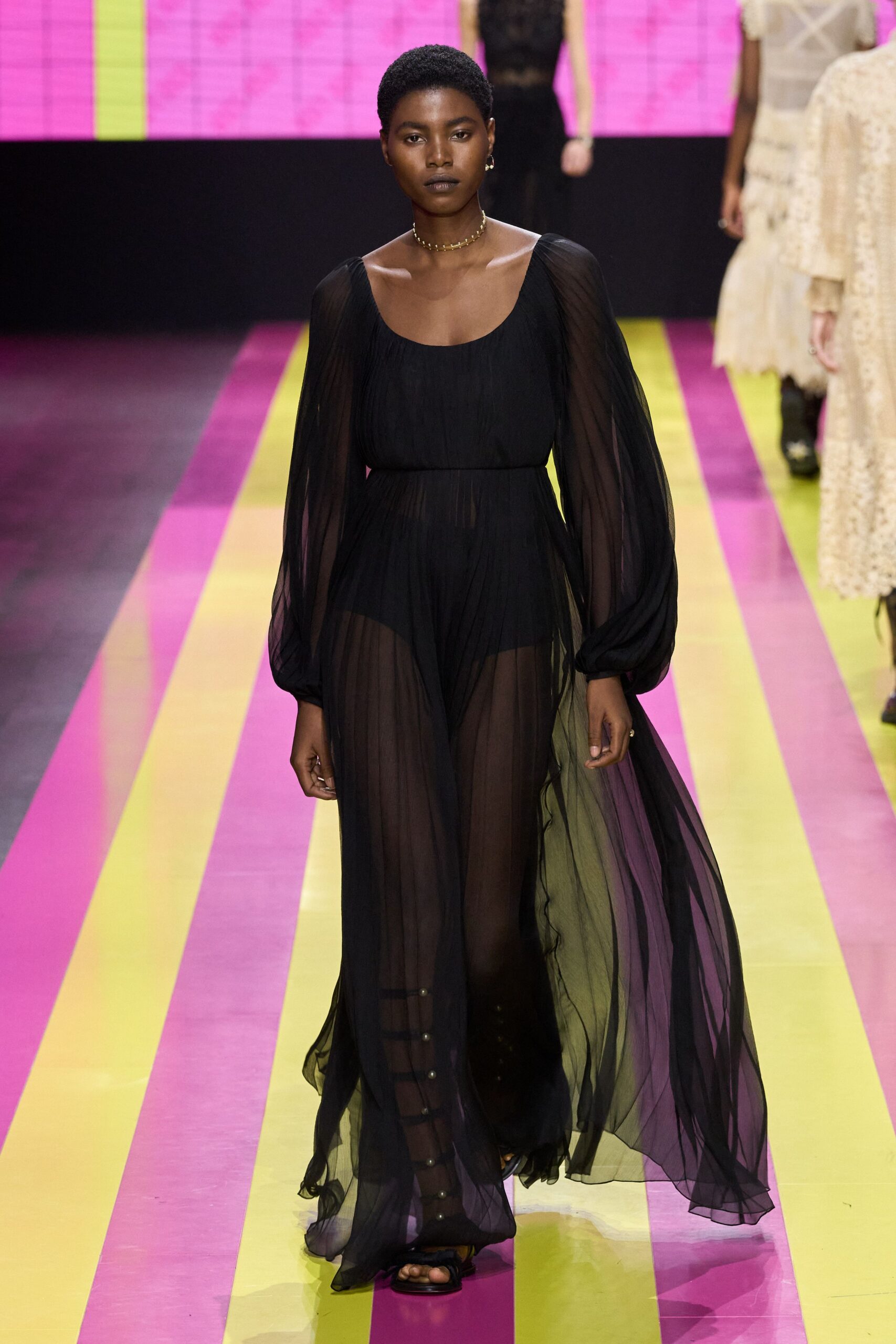 black sheer gown with long sleeves