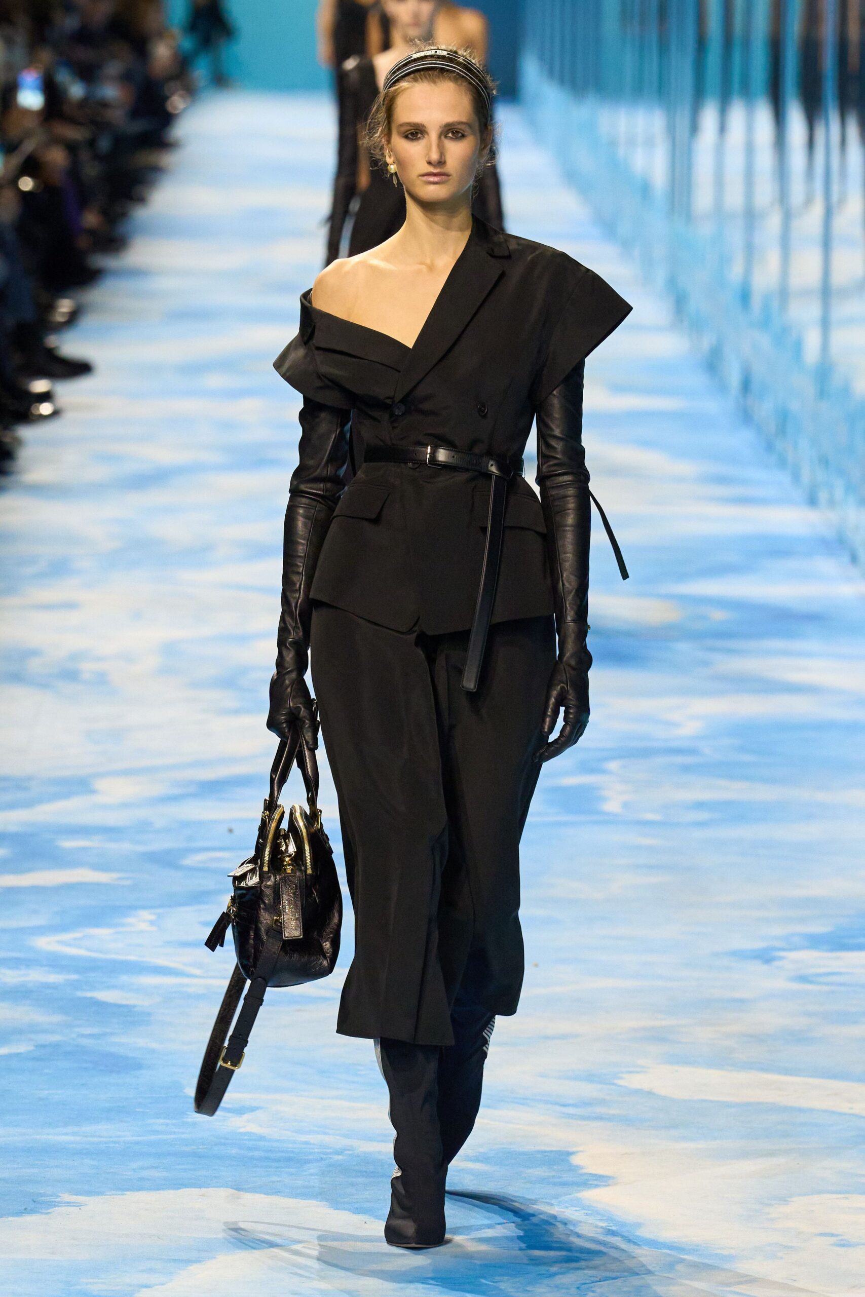 black cotton long-sleeve off-shoulder fitted structured belted jumpsuit
