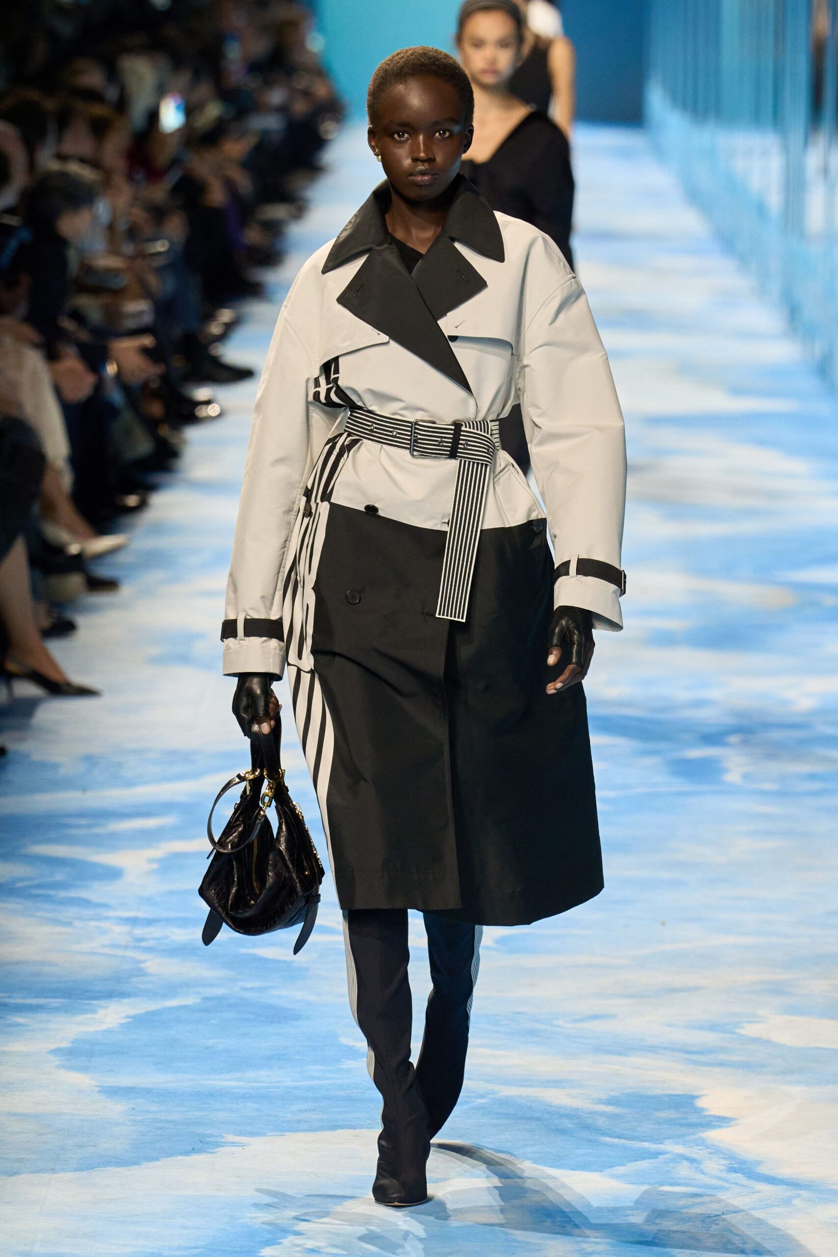 black and white vinyl trench coat