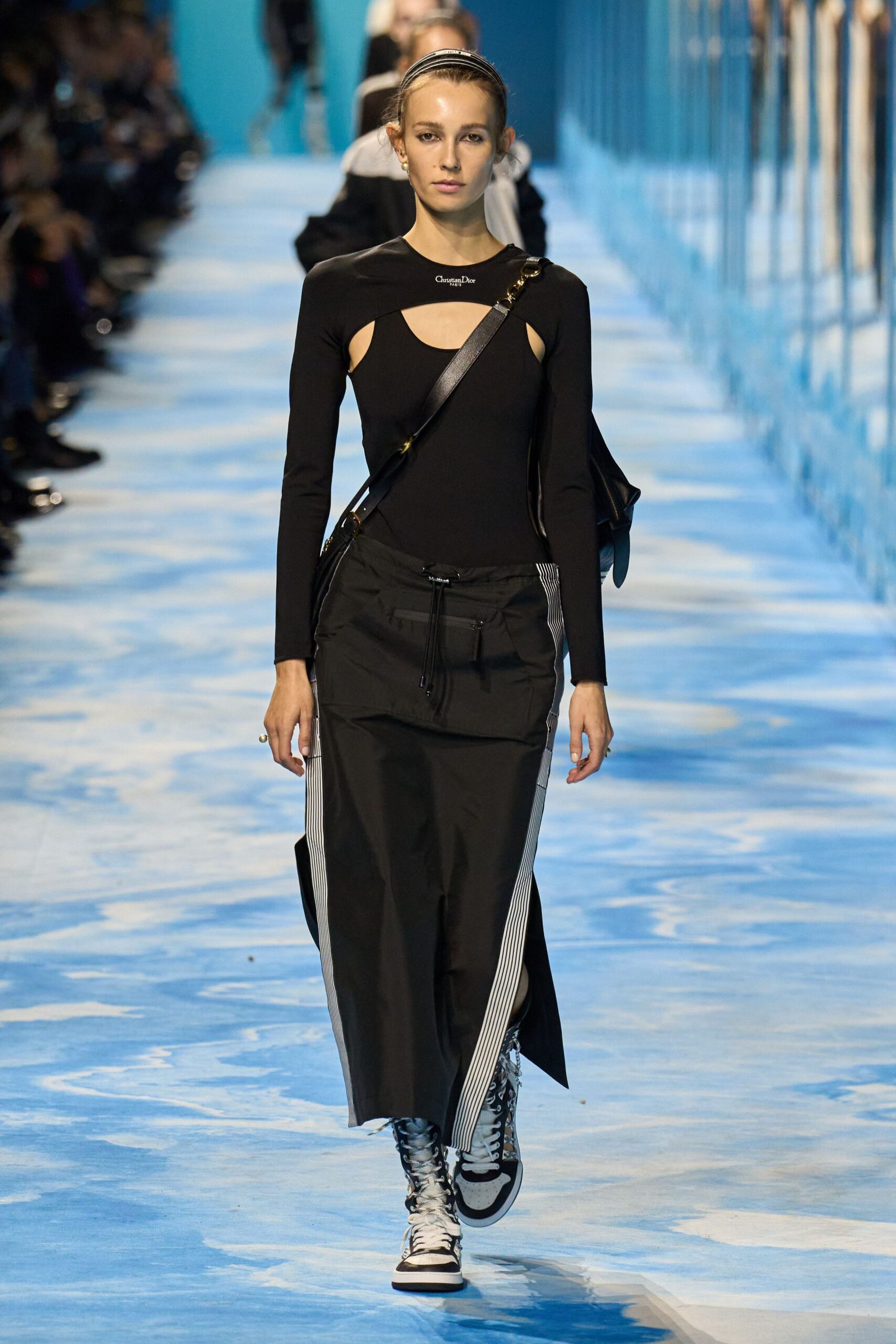 black fitted top and midi skirt