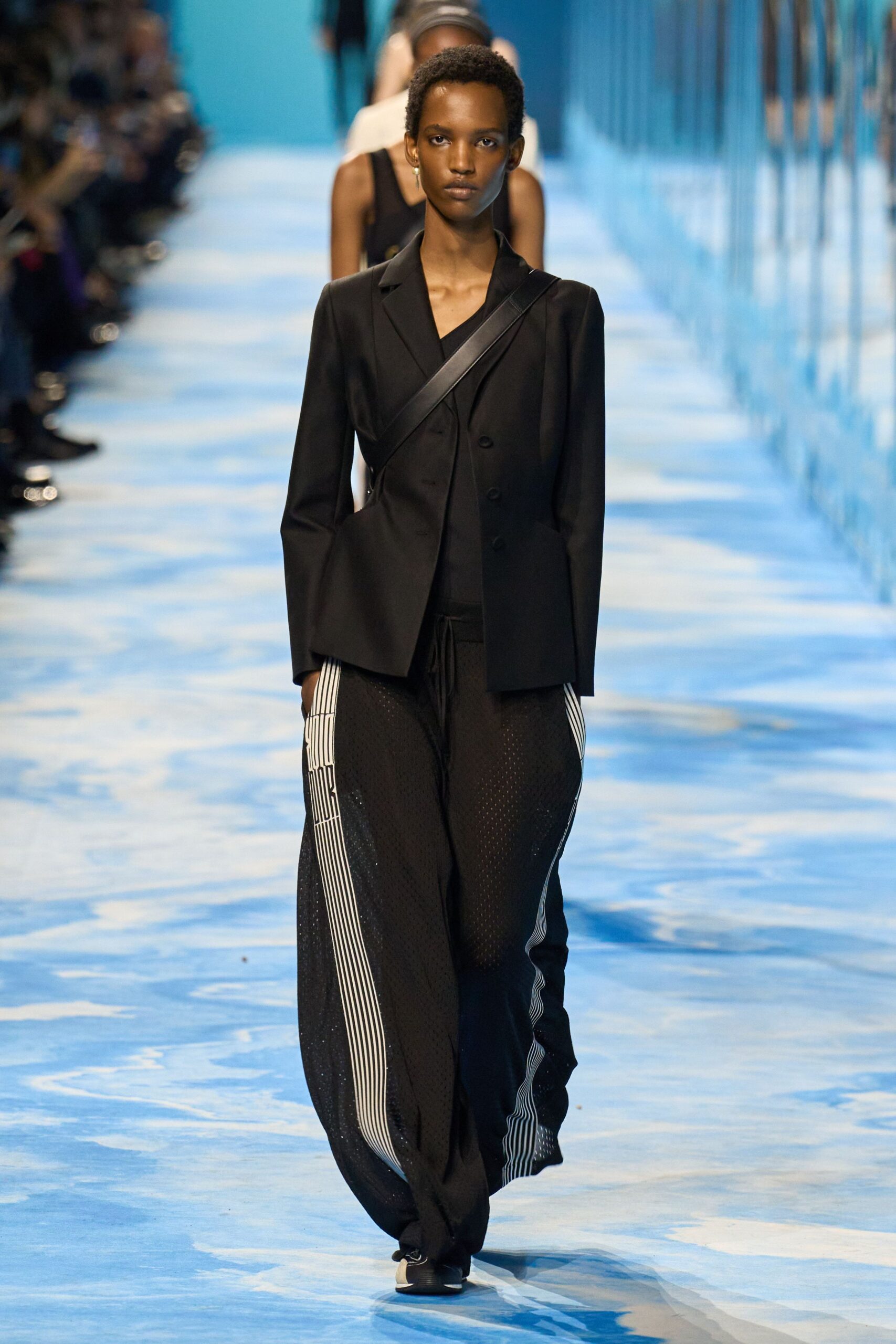black structured blazer and relaxed pants