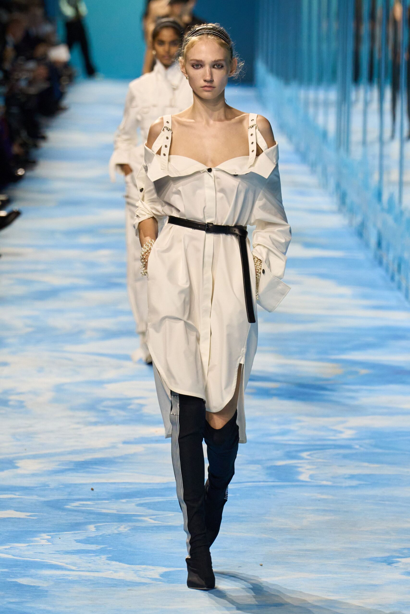 white shirt-dress with black boots