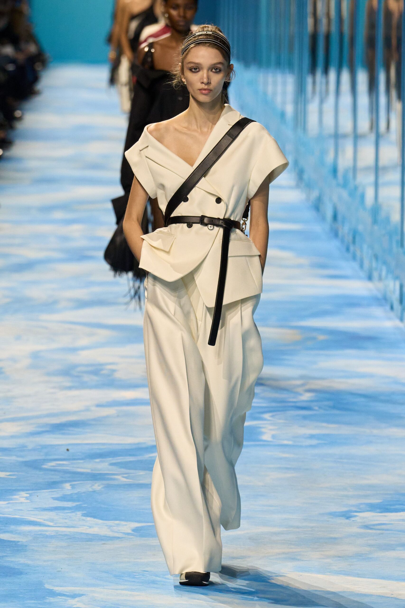 white fitted sleeveless jumpsuit