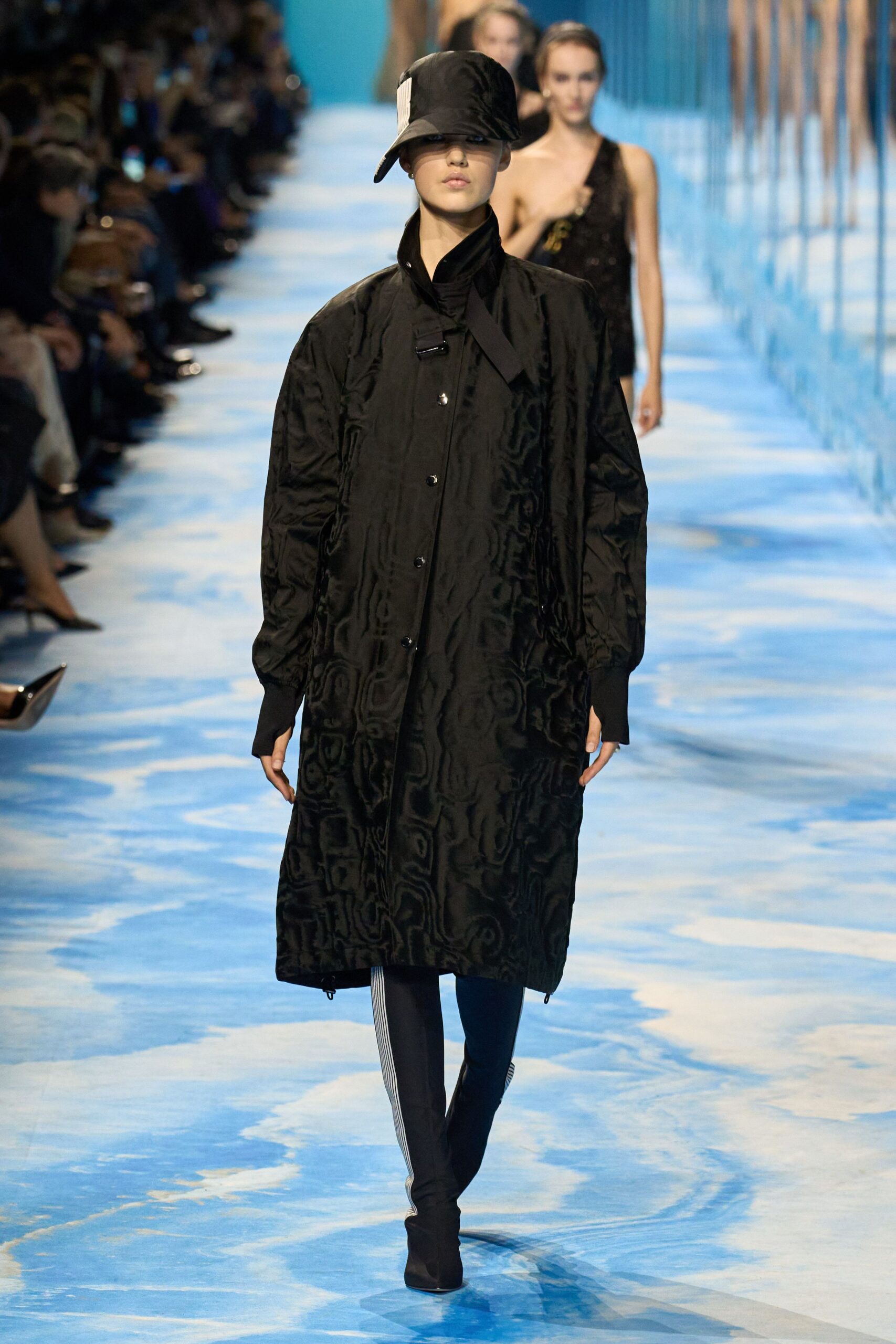 black relaxed coat with fitted pants