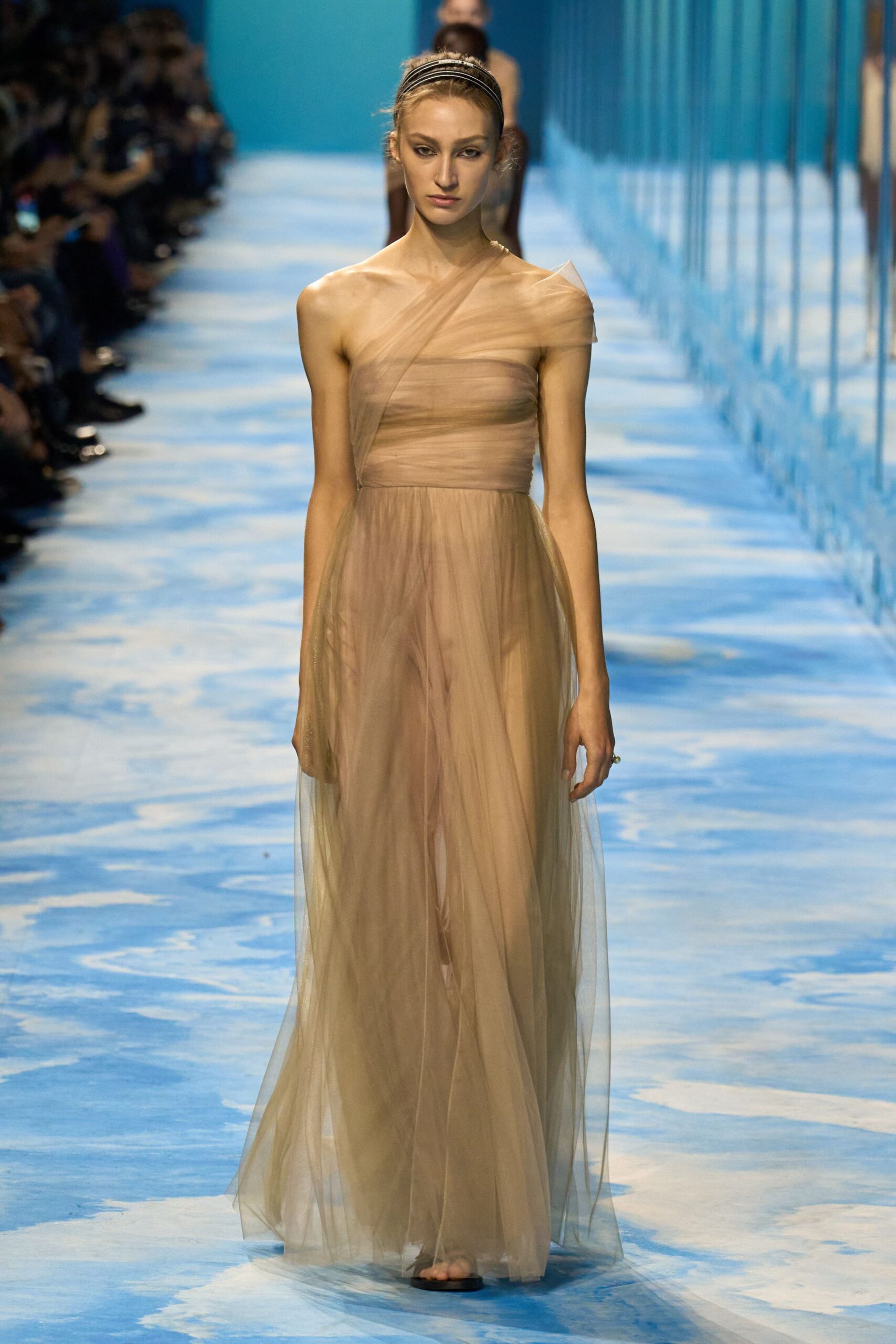 beige flowing off-shoulder gown
