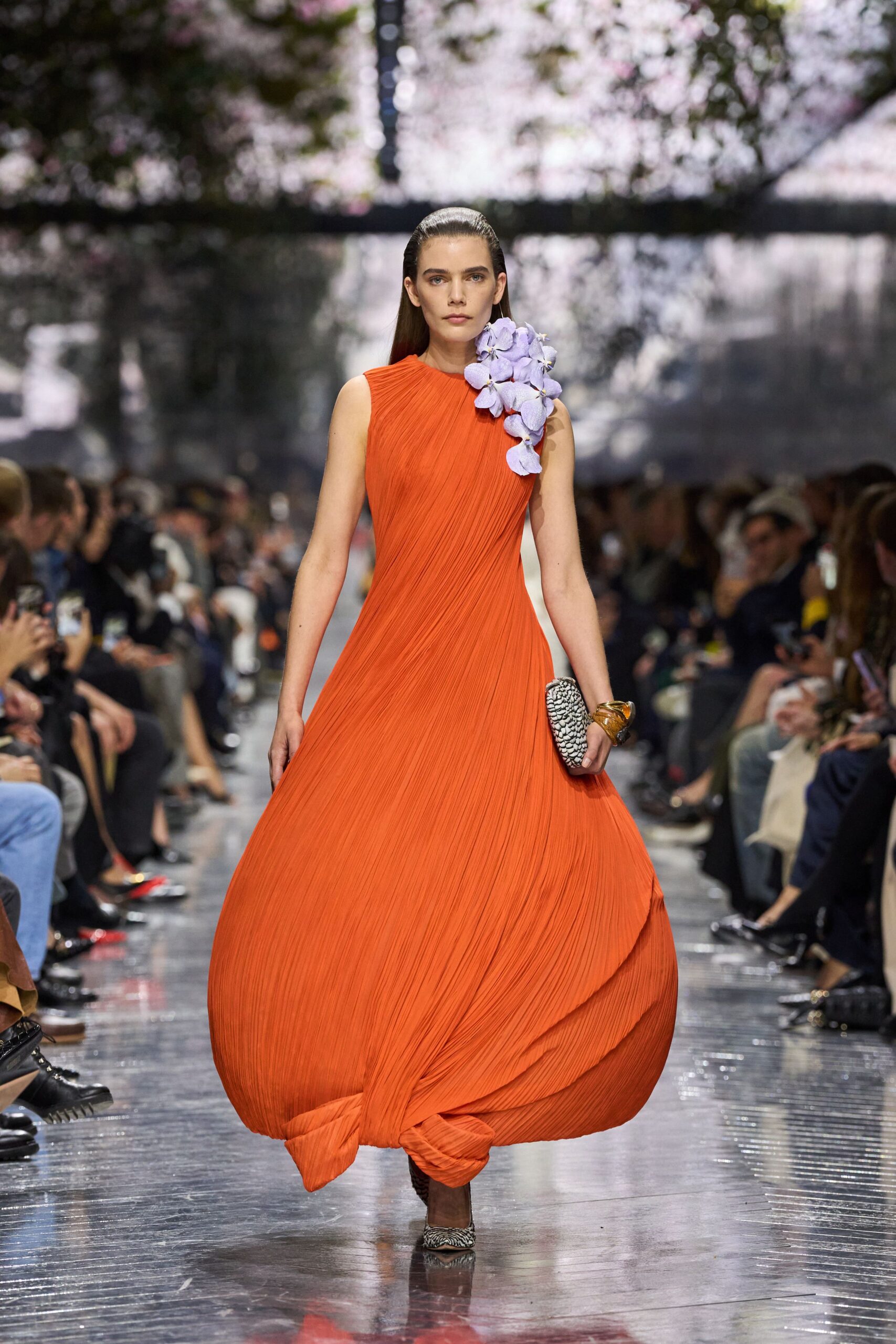 orange silk sleeveless high-neck fitted pleated flowing gown