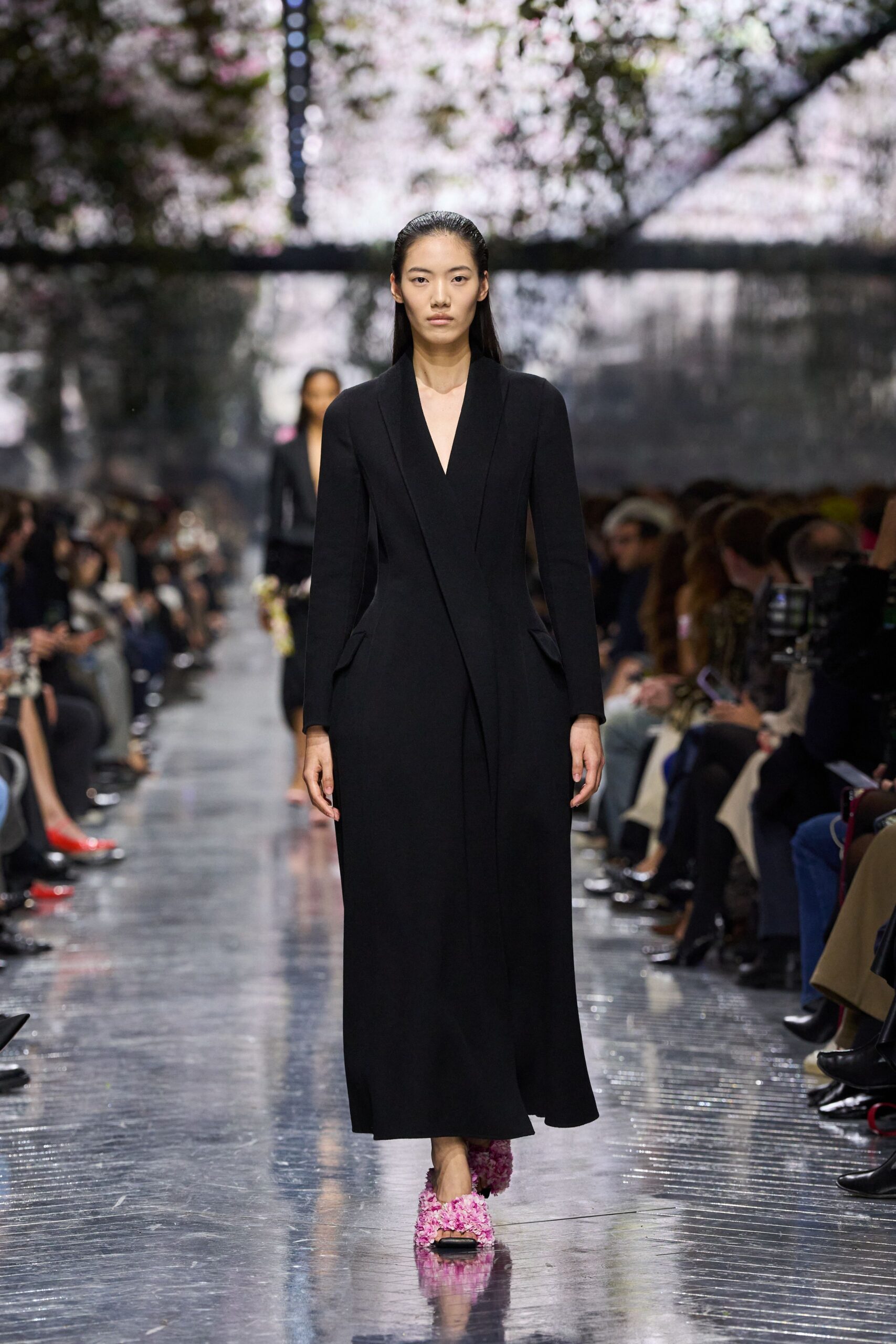black silk long-sleeve gown with pink shoes