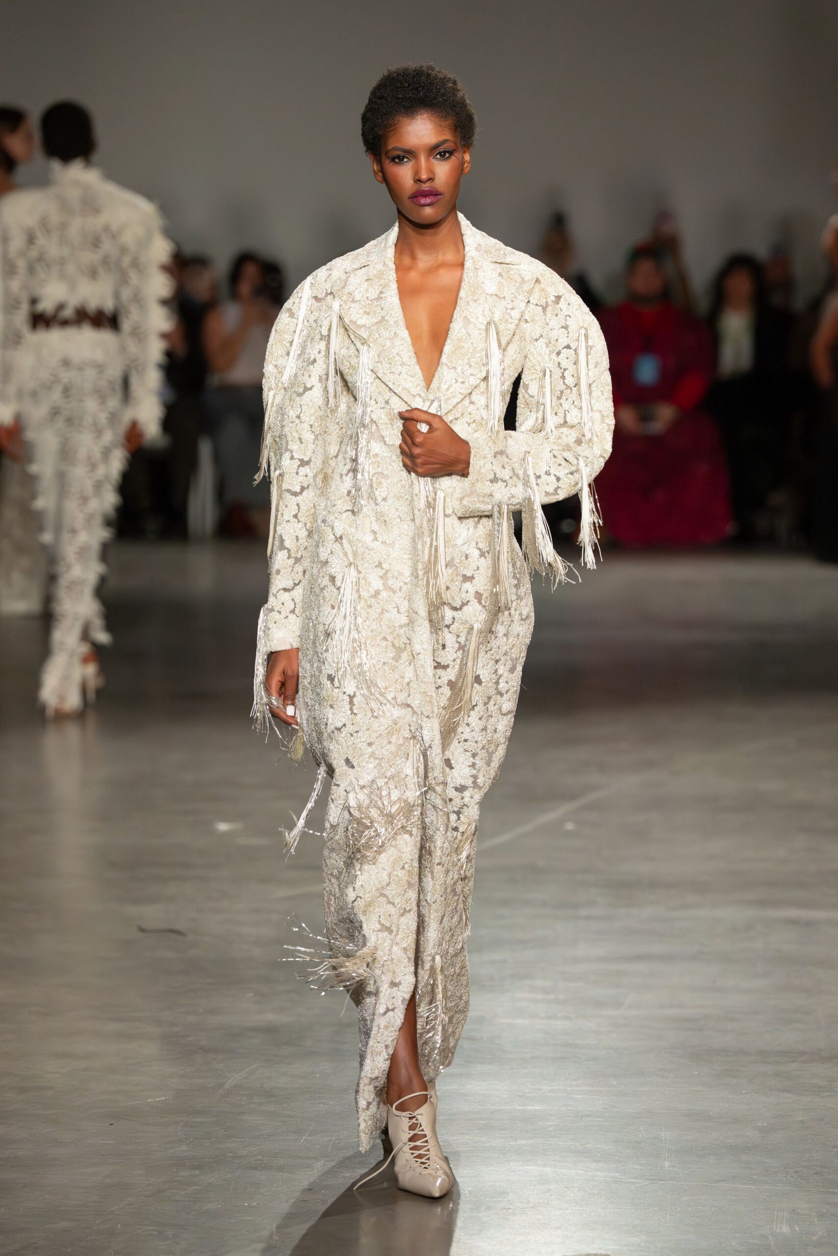 white embroidered fringed gown