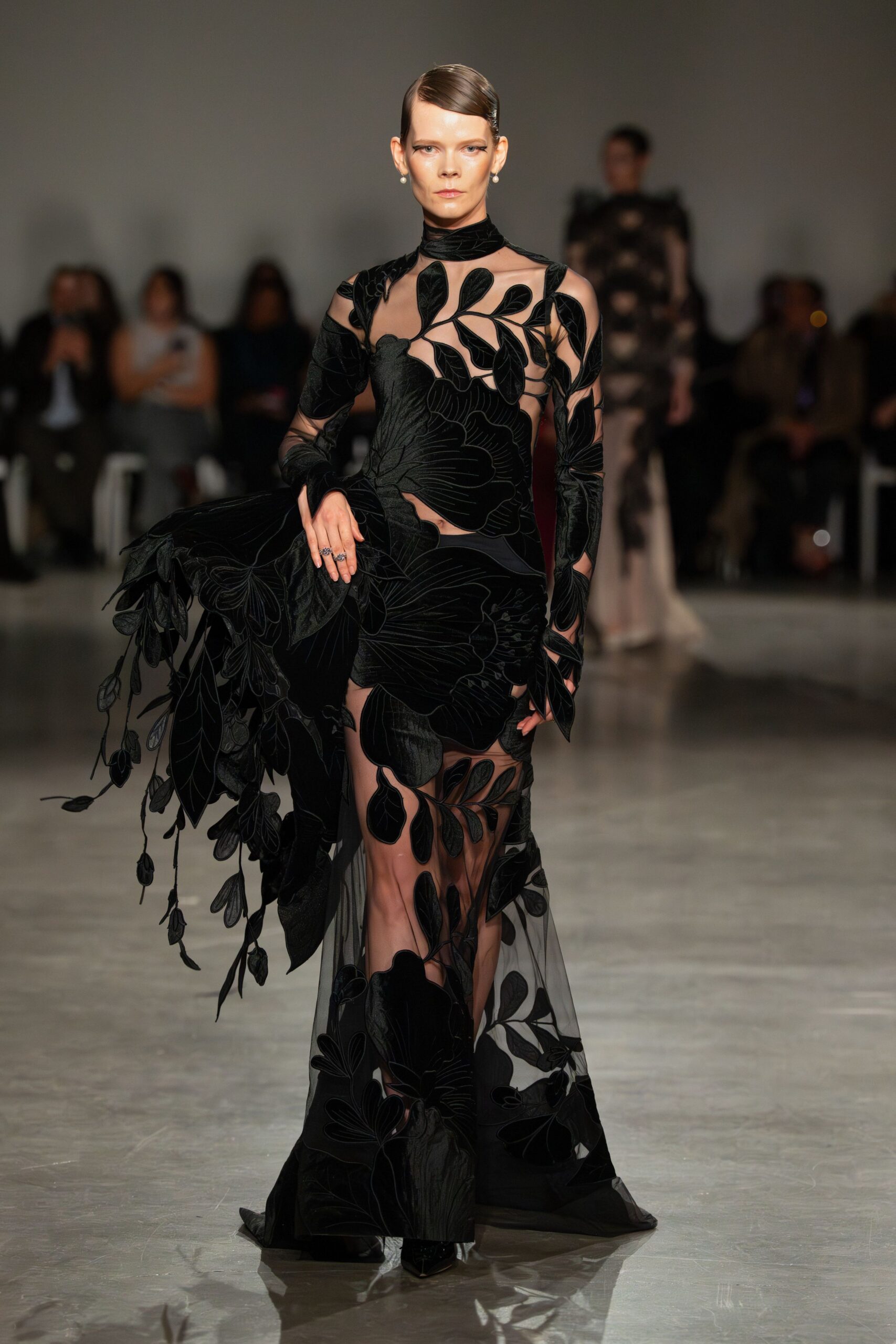 black embroidered long-sleeve gown