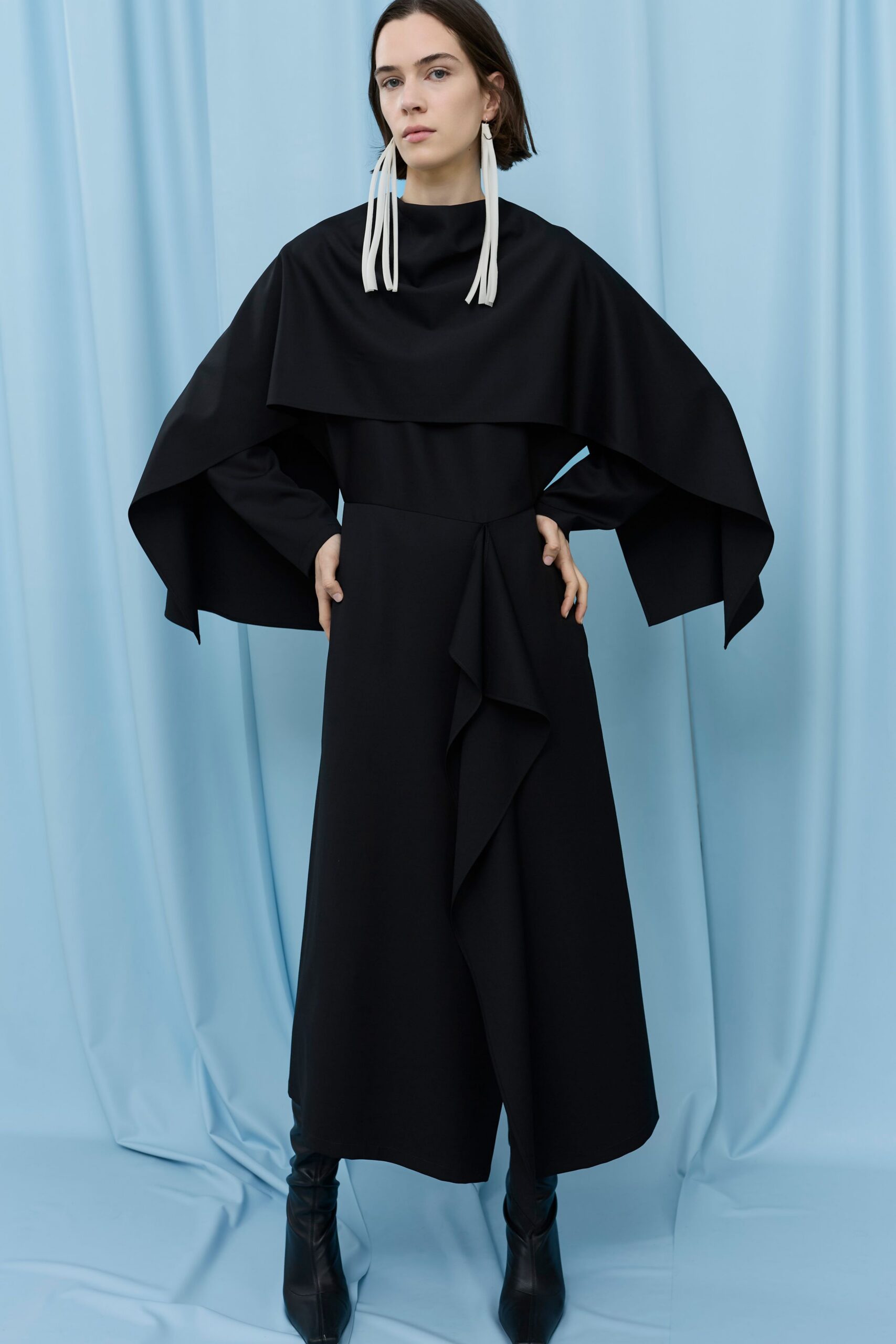 black draped maxi dress with boots