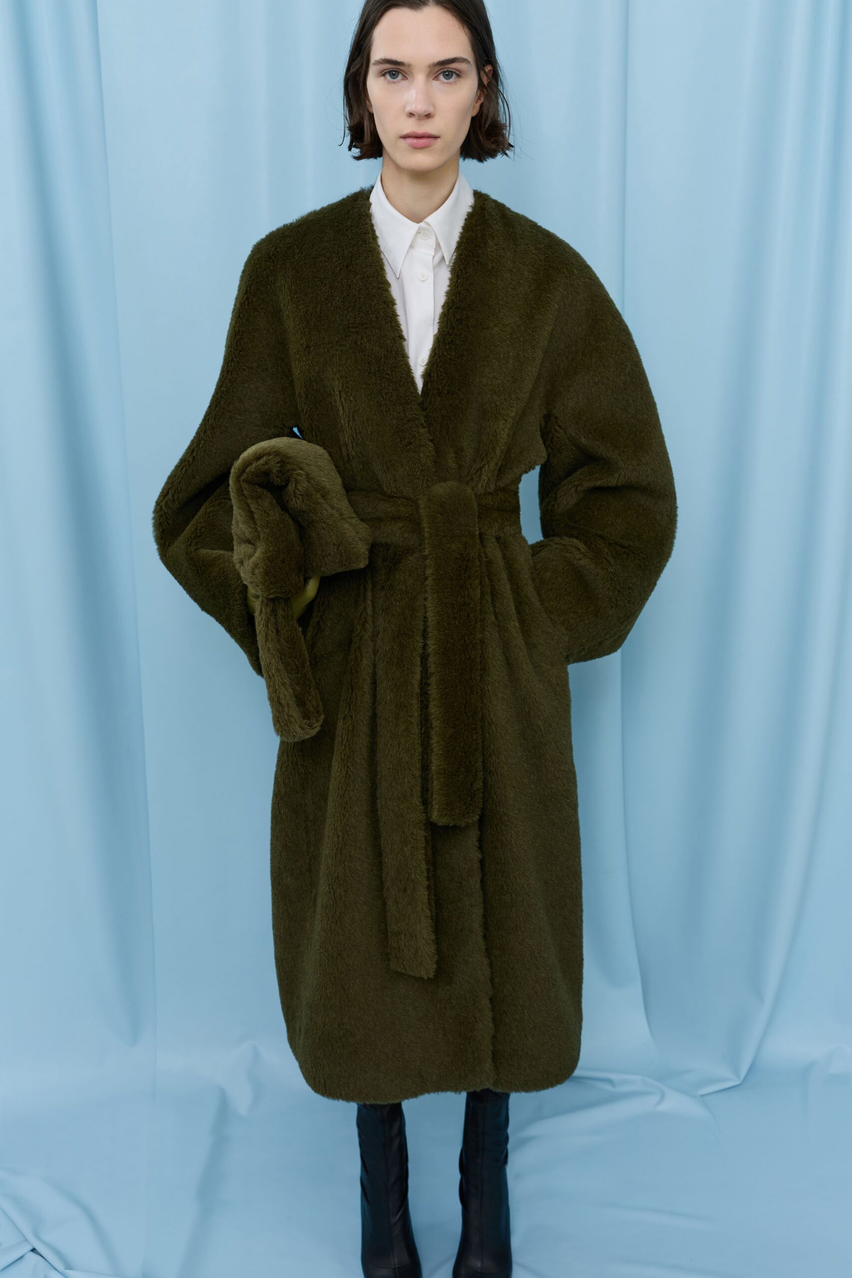 green faux-fur coat with white shirt