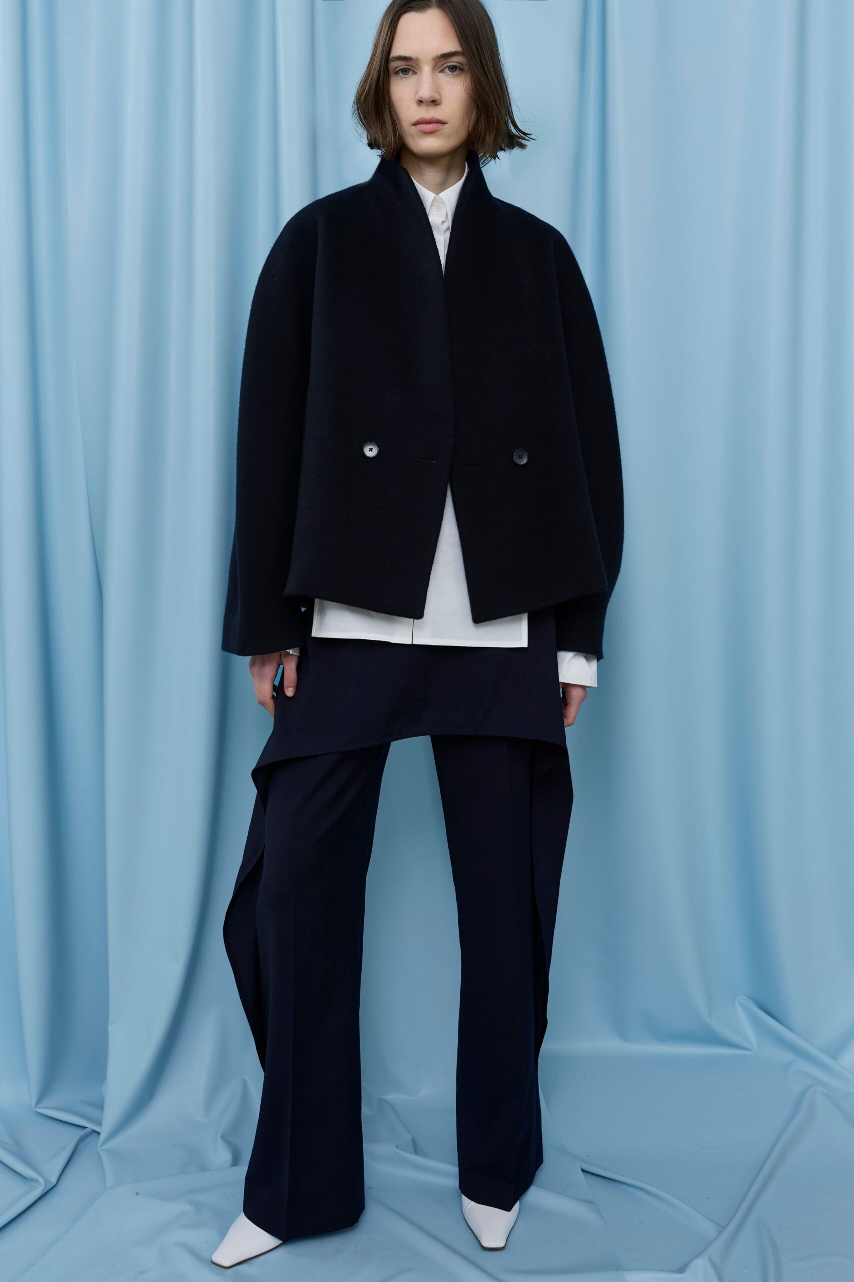 black wool long-sleeve collared relaxed buttoned cape