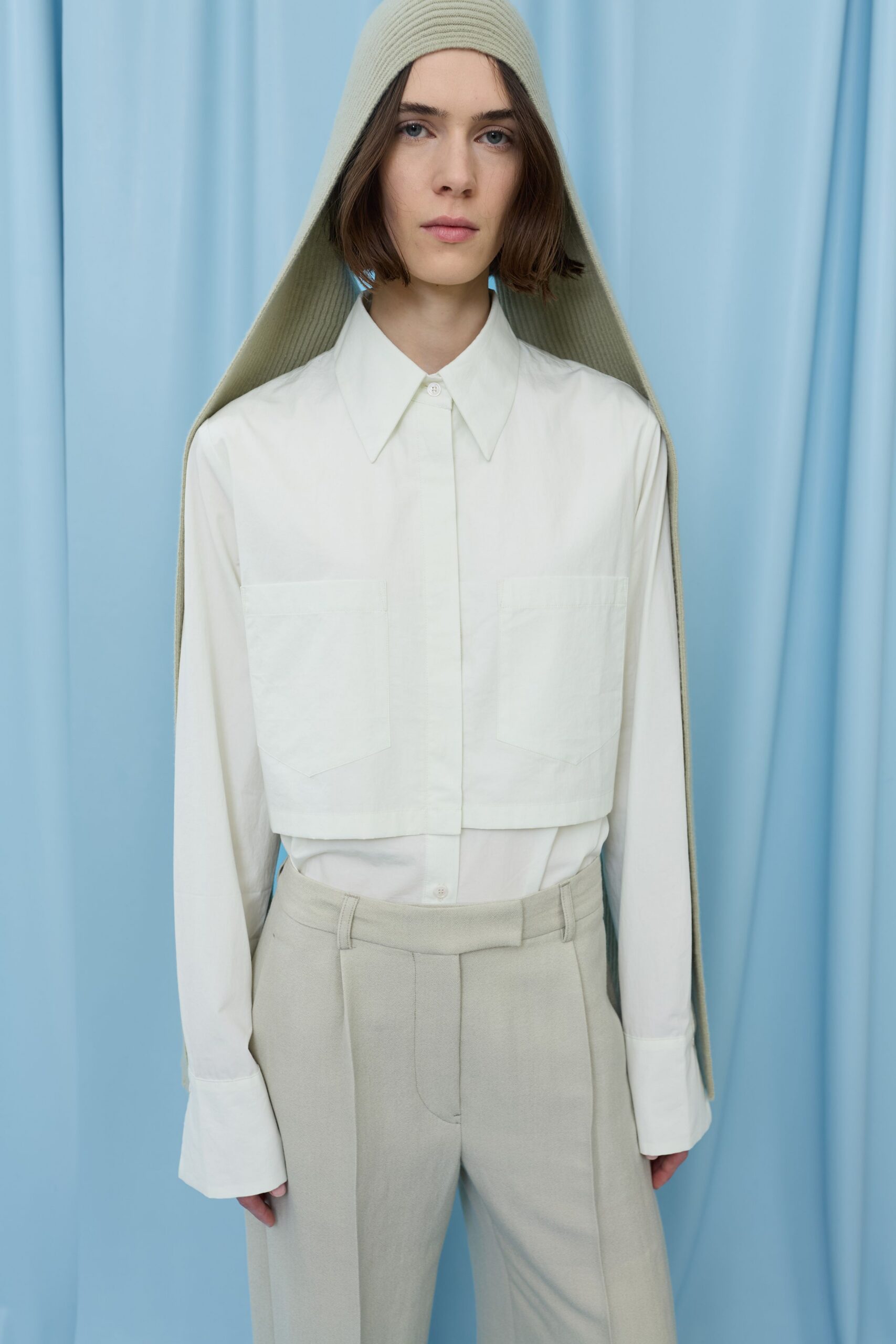 white fitted shirt beige tailored pants