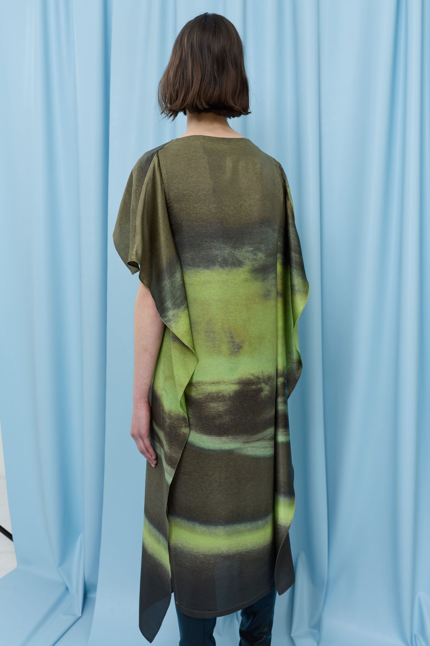 green and brown flowing dress