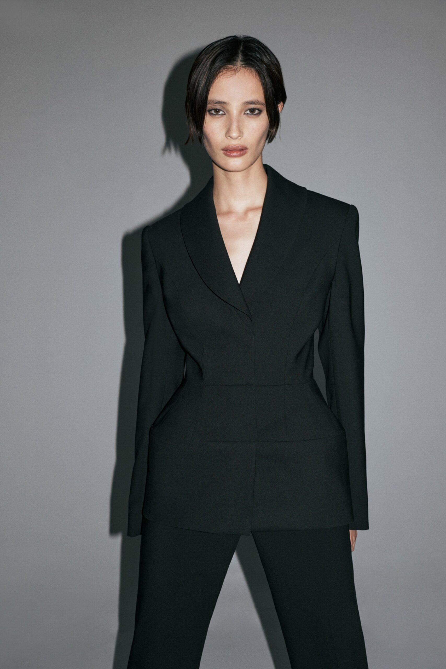black structured blazer and tailored pants