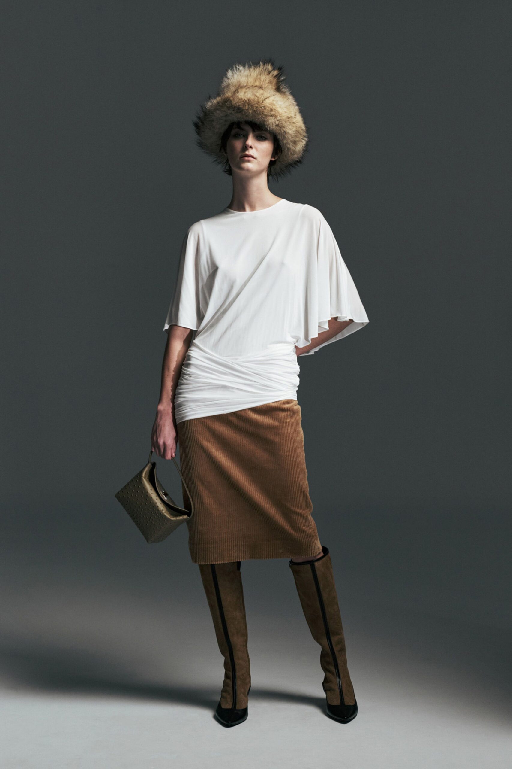 white relaxed top with brown pencil skirt