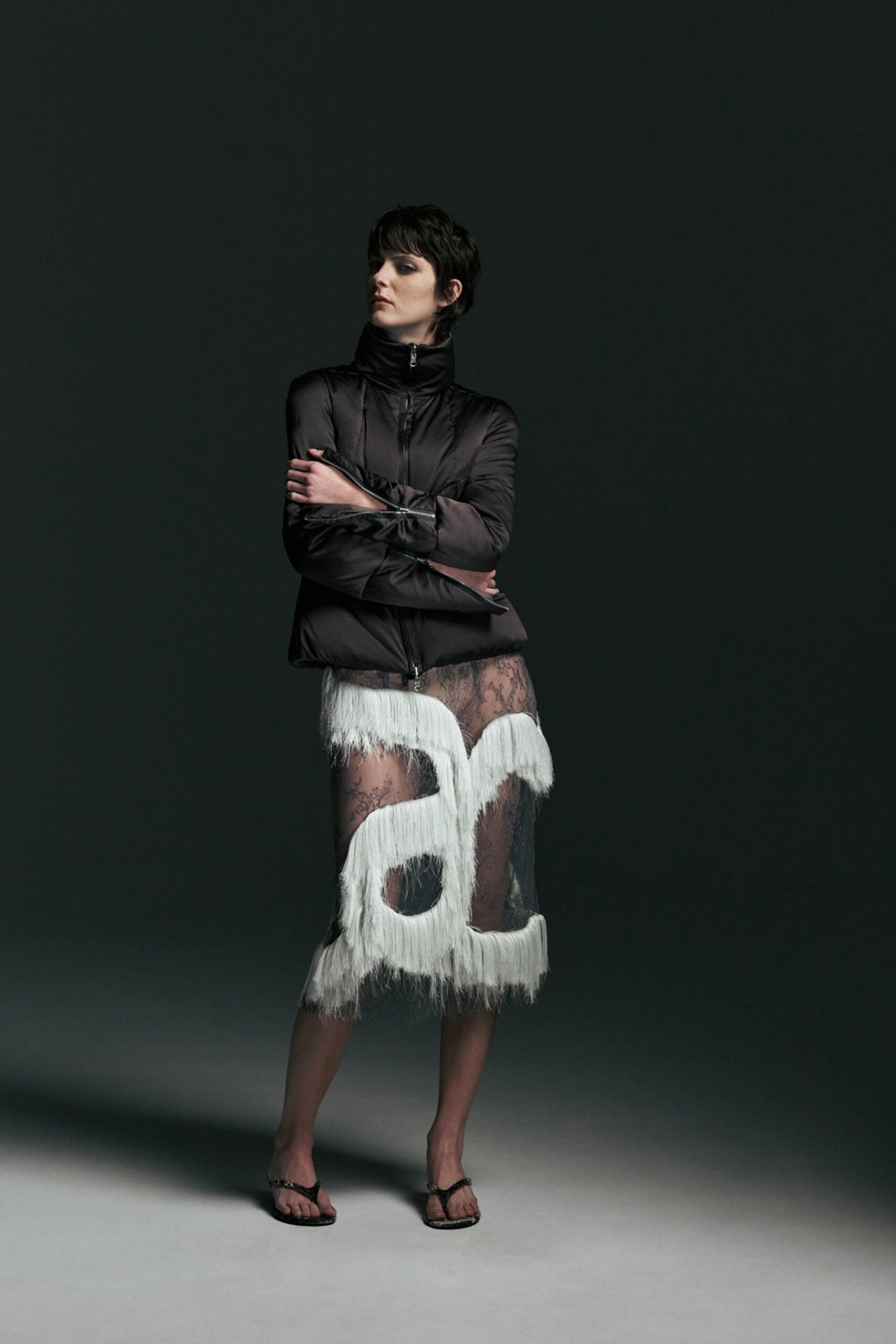black jacket white fringed skirt