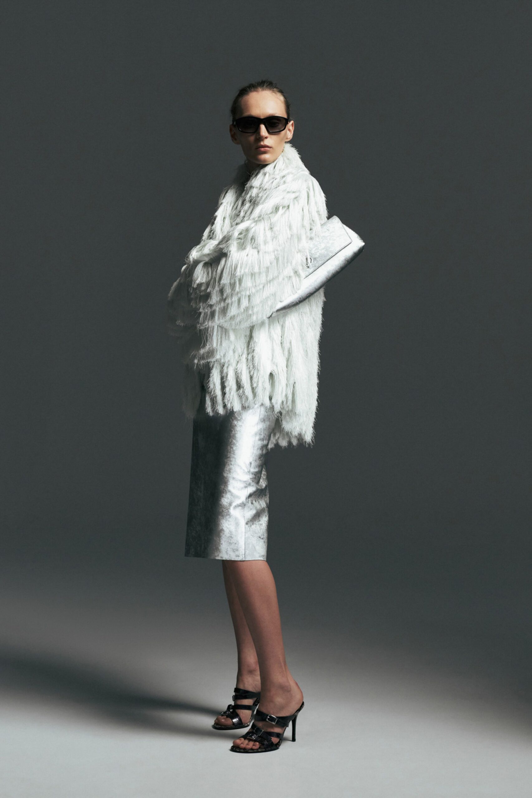 white fur coat with silver skirt